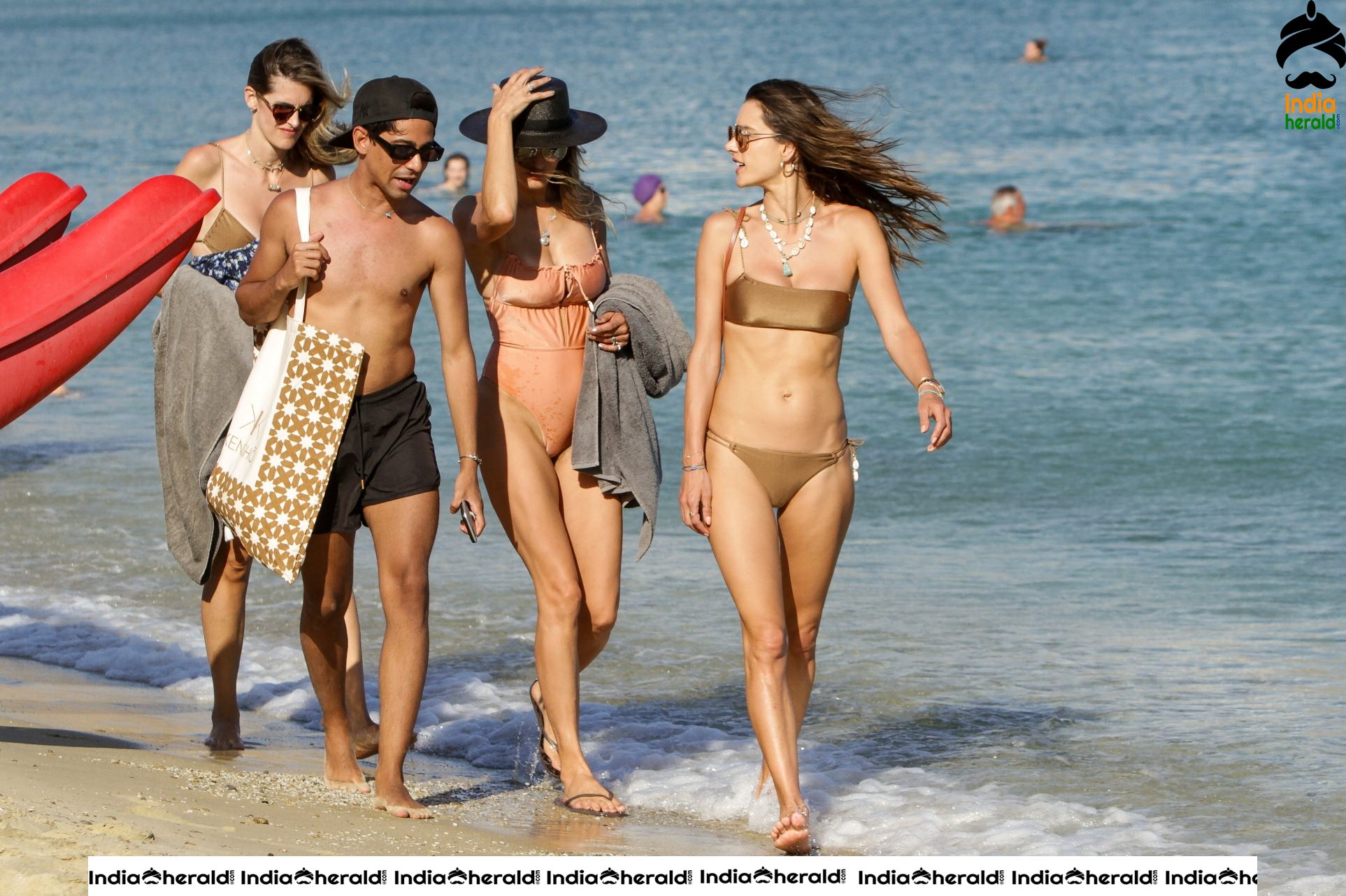 Alessandra Ambrosio in Brown Bikini on the beach in Mykonos