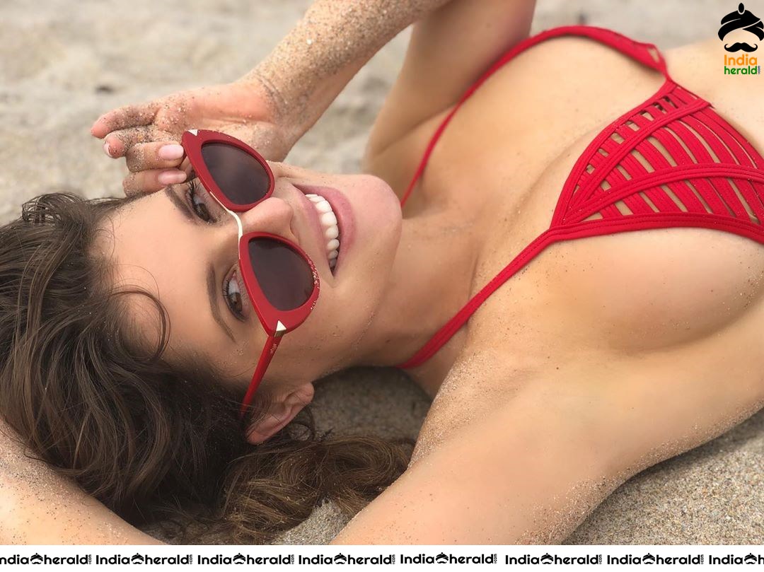 Amanda Cerny in a Red Bikini Top