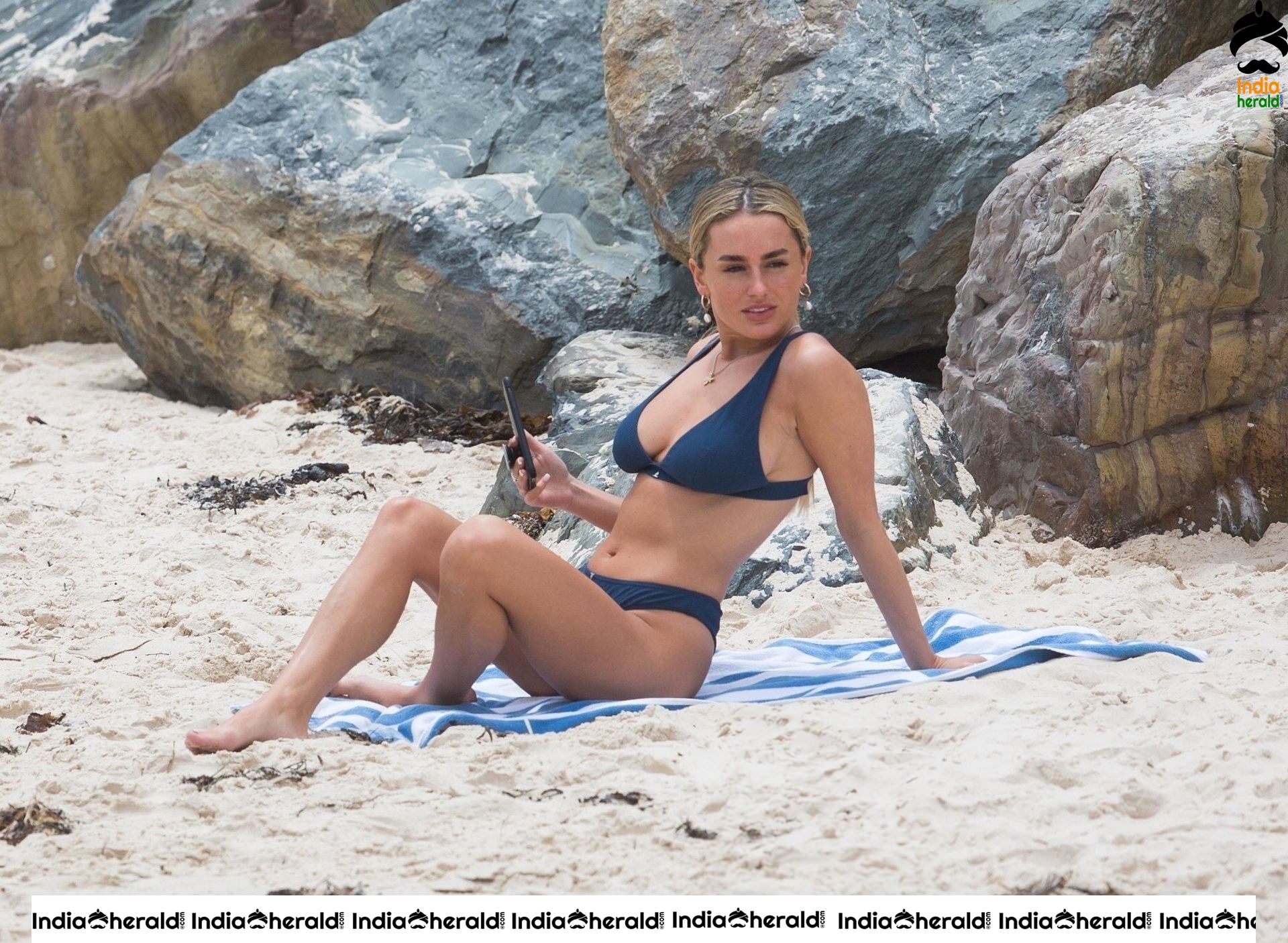 Amber Caught in Two Piece Bikini while relaxing at the Beach