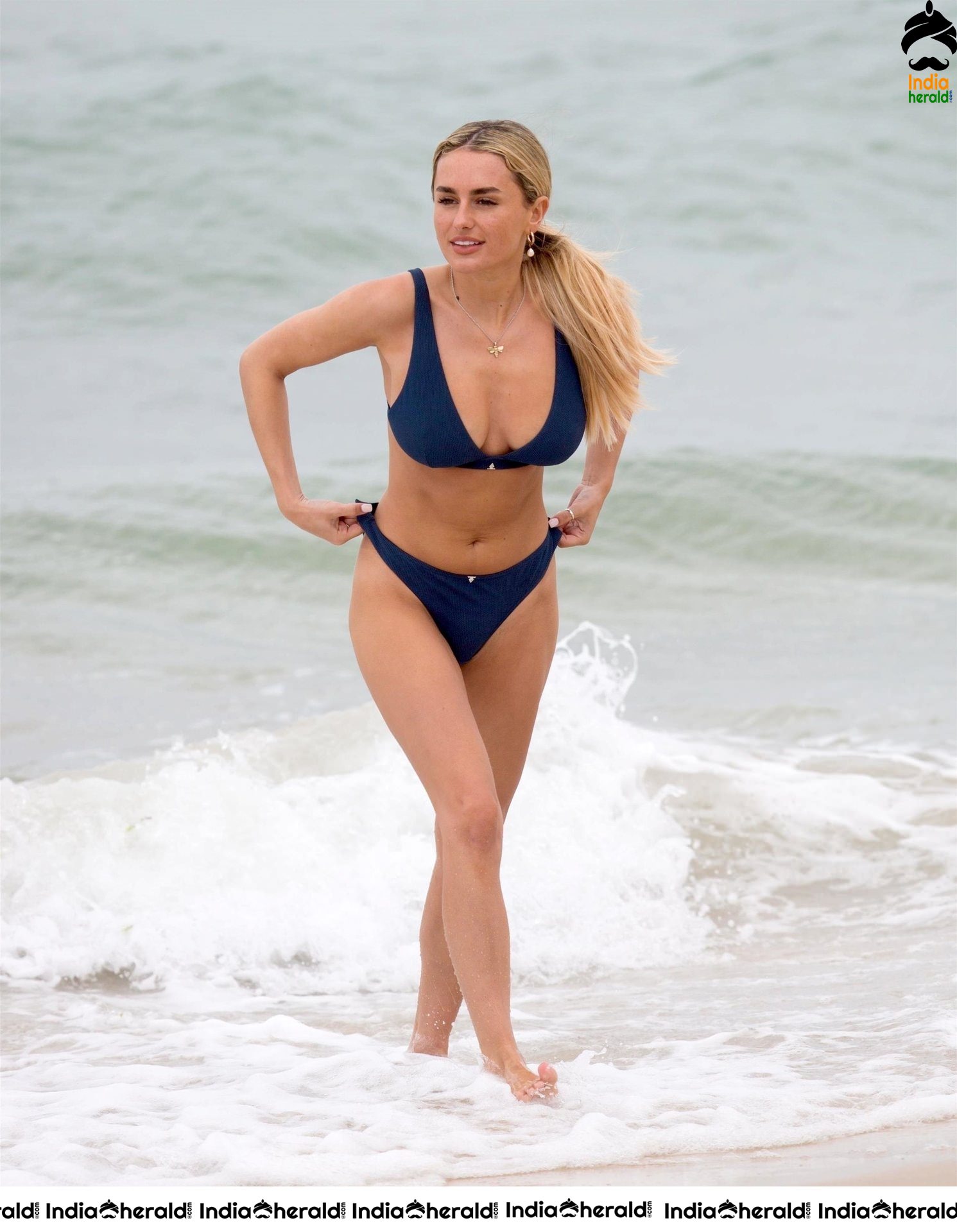 Amber Caught in Two Piece Bikini while relaxing at the Beach