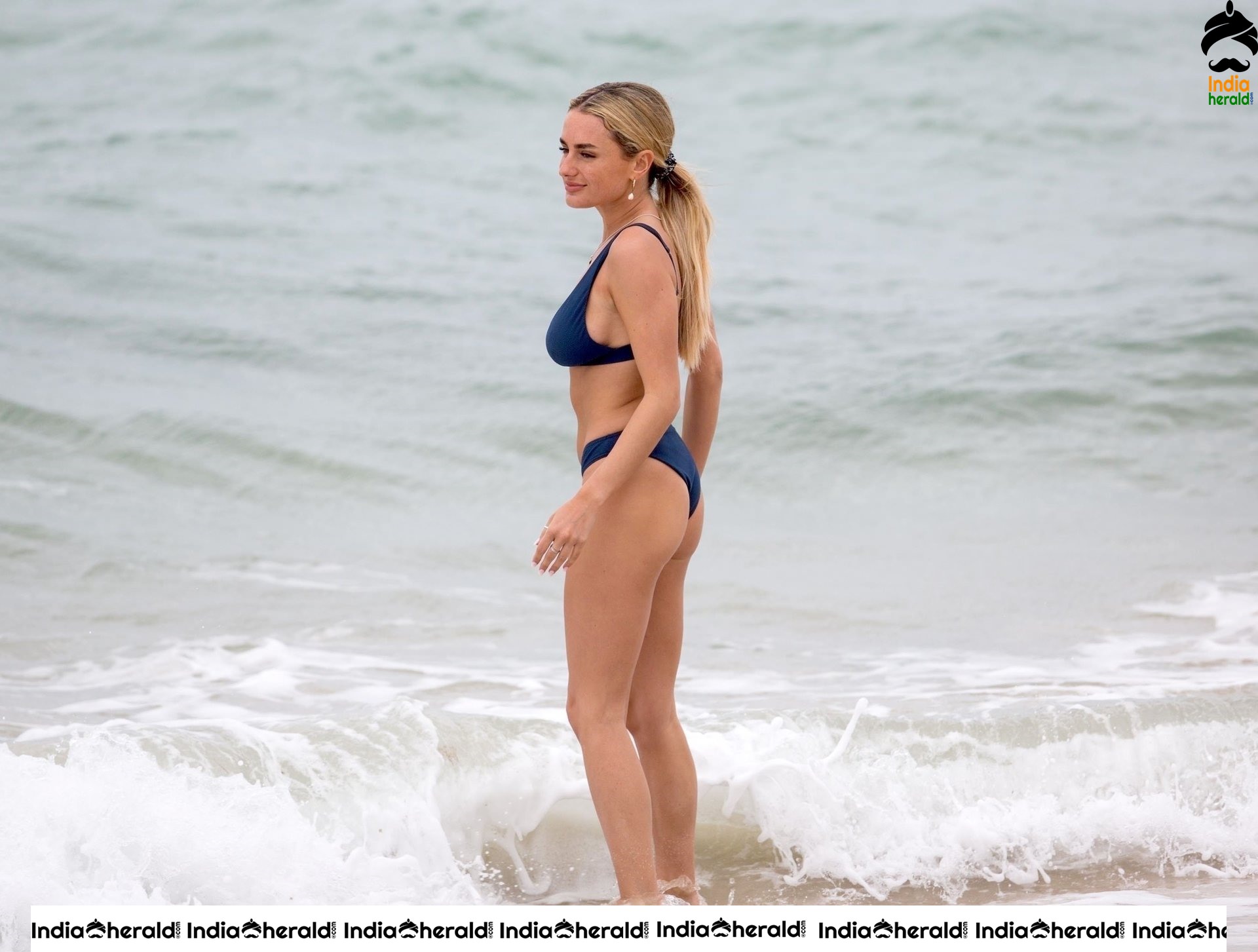 Amber Caught in Two Piece Bikini while relaxing at the Beach
