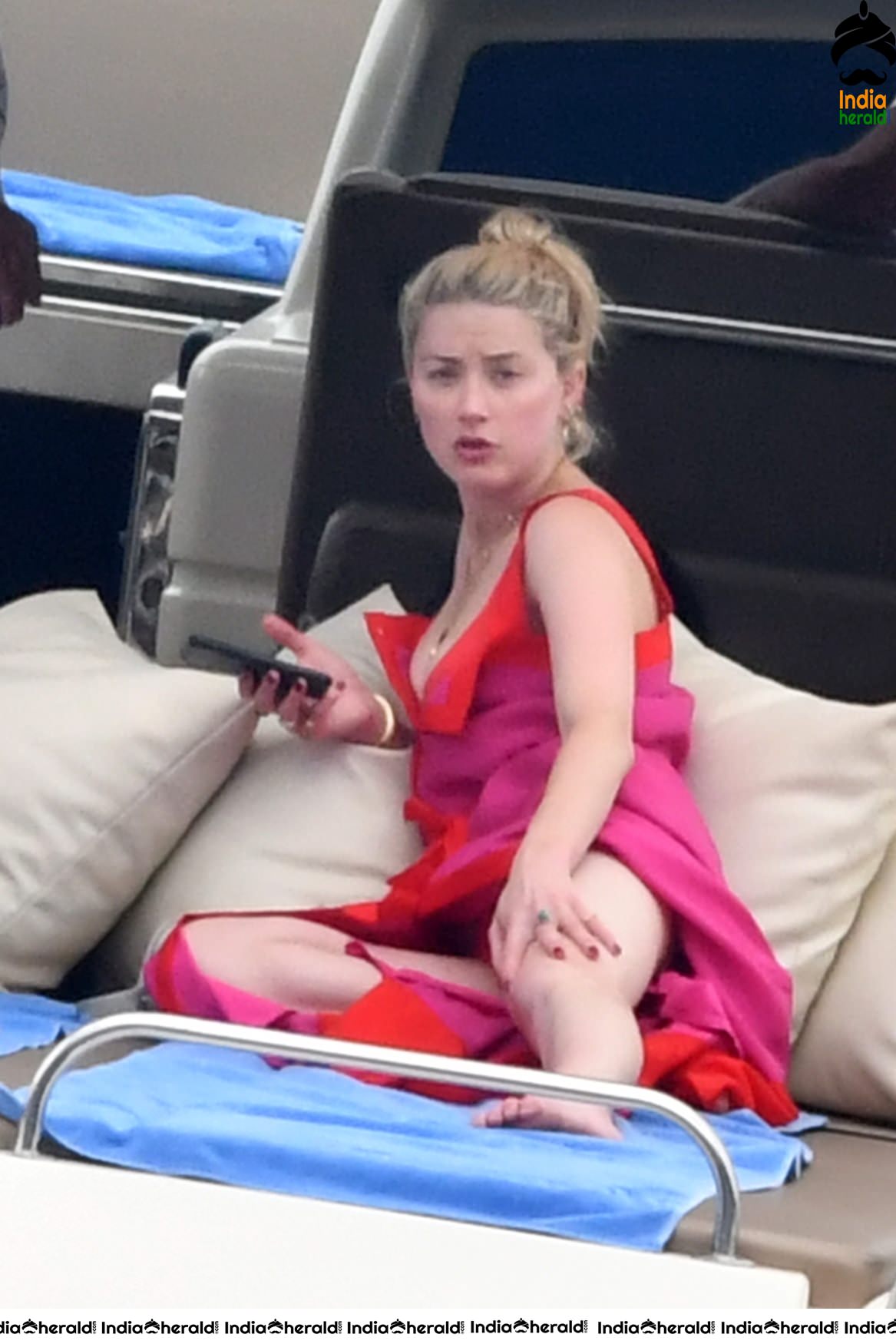 Amber Heard in Two Piece Bikini and enjoys a day with friends on a yacht at the Amalfi Coast