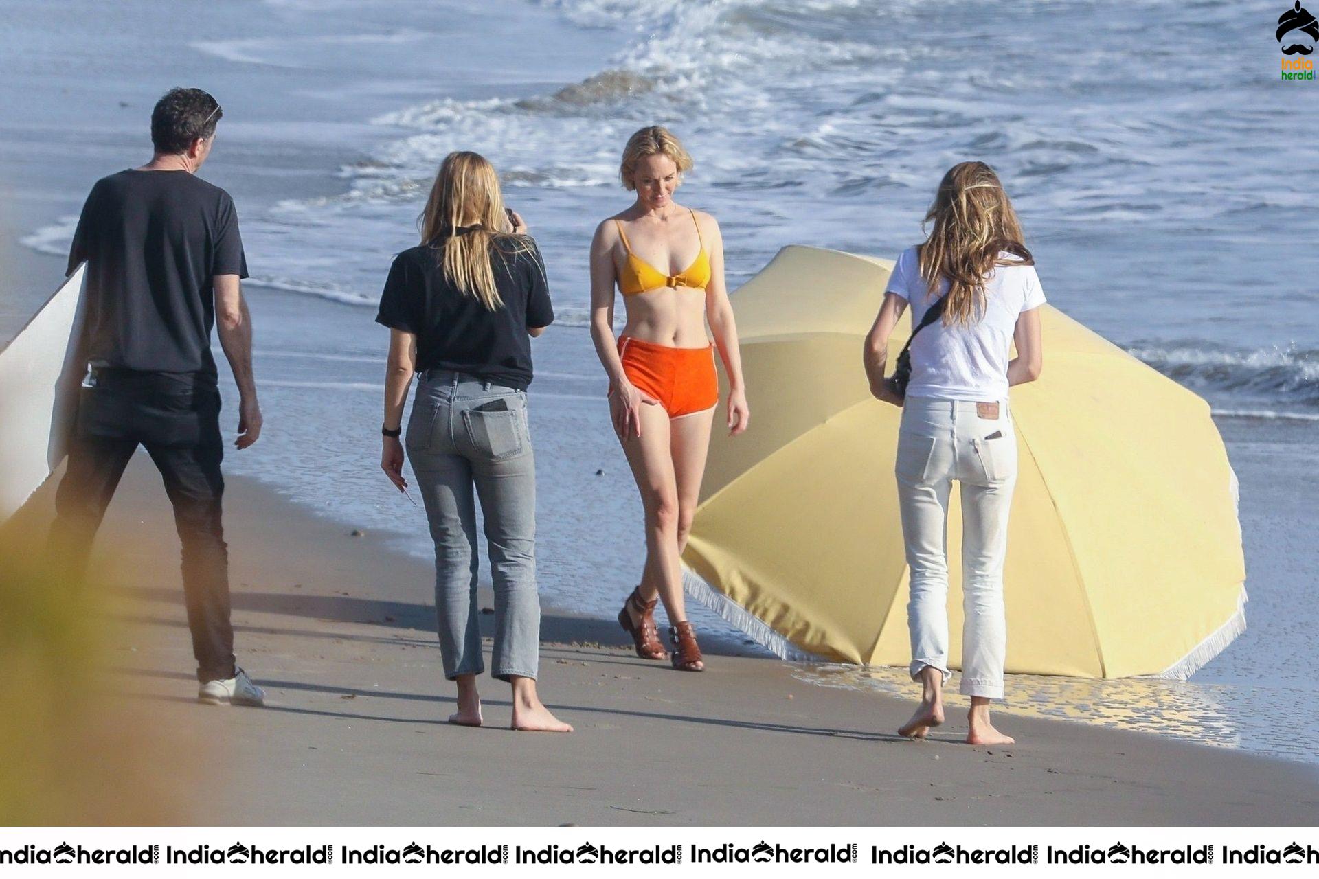 Amber Valletta poses in a bikini on the beach in Malibu