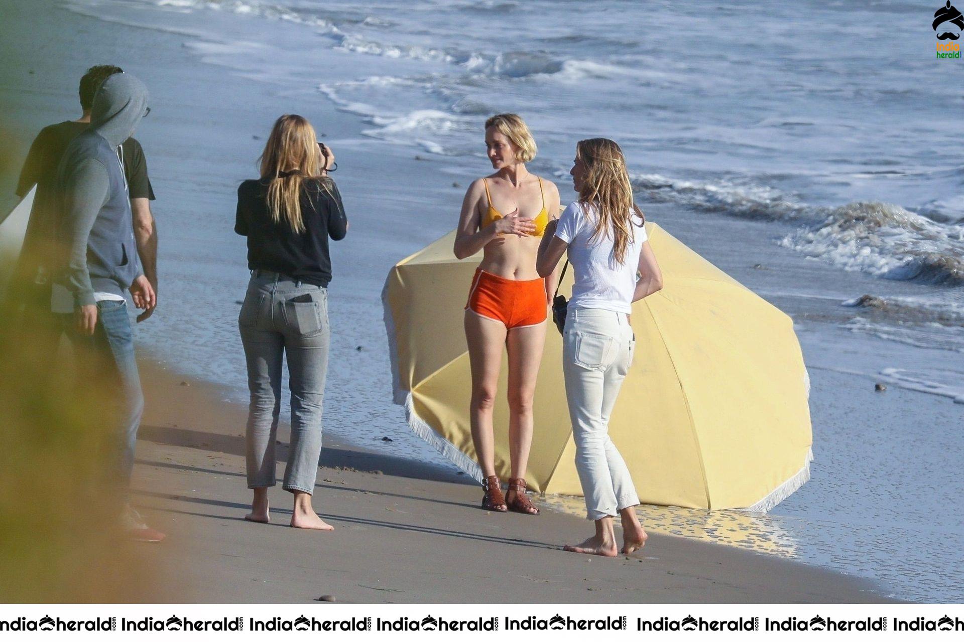 Amber Valletta poses in a bikini on the beach in Malibu