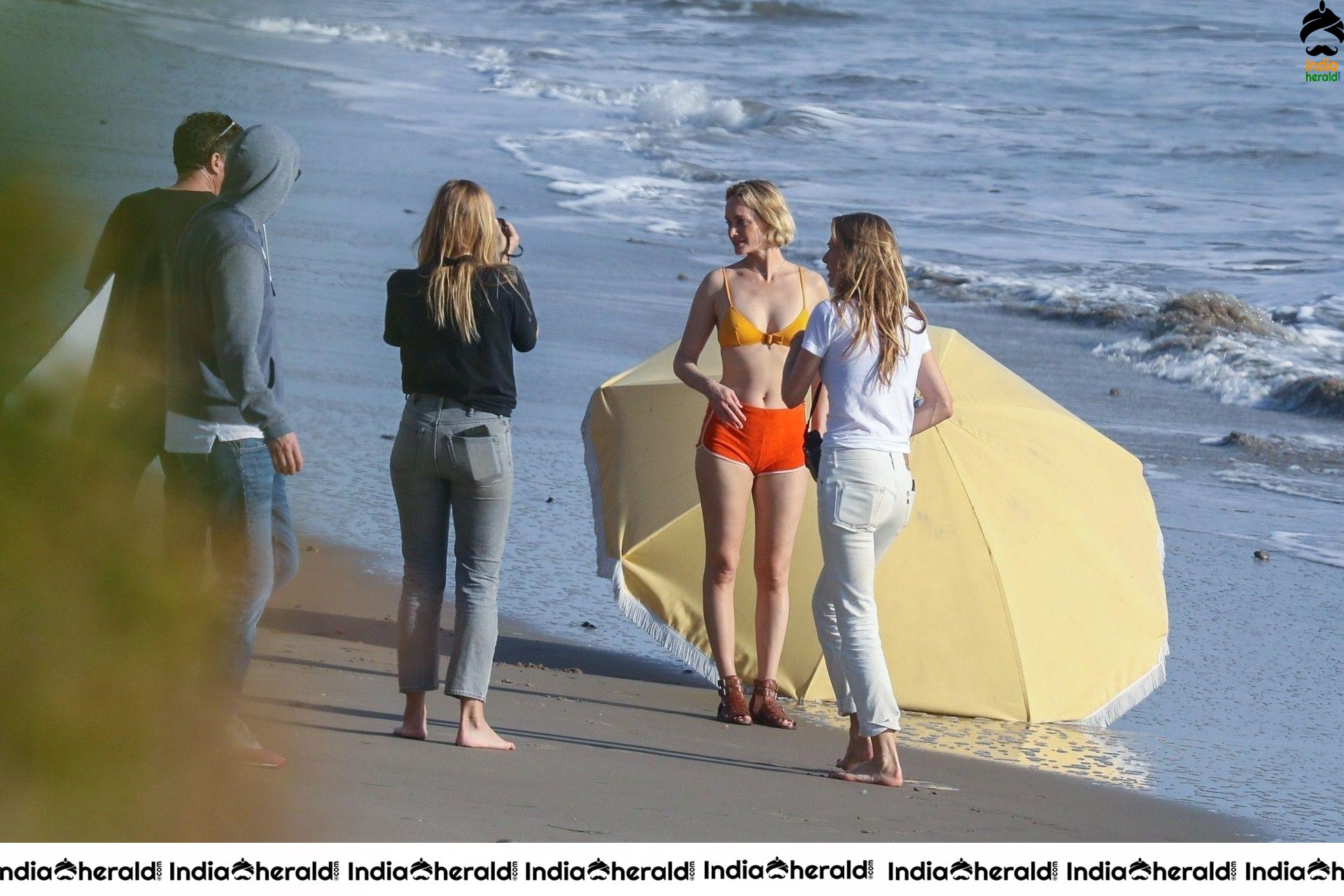 Amber Valletta poses in a bikini on the beach in Malibu