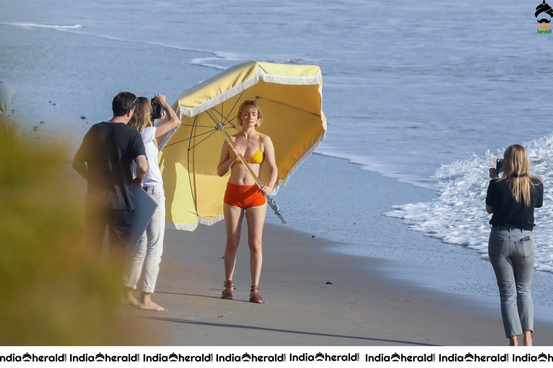 Amber Valletta poses in a bikini on the beach in Malibu