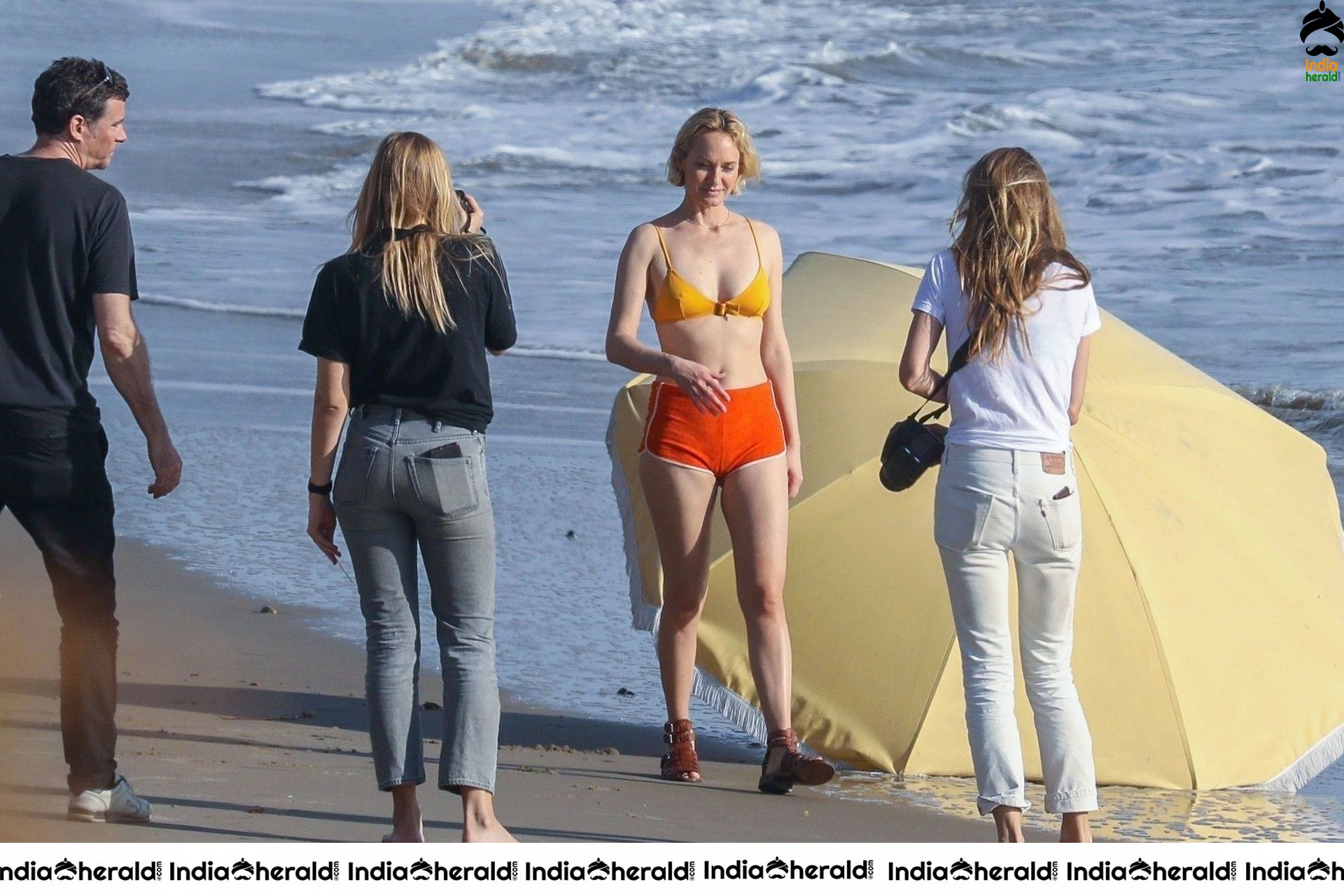 Amber Valletta poses in a bikini on the beach in Malibu