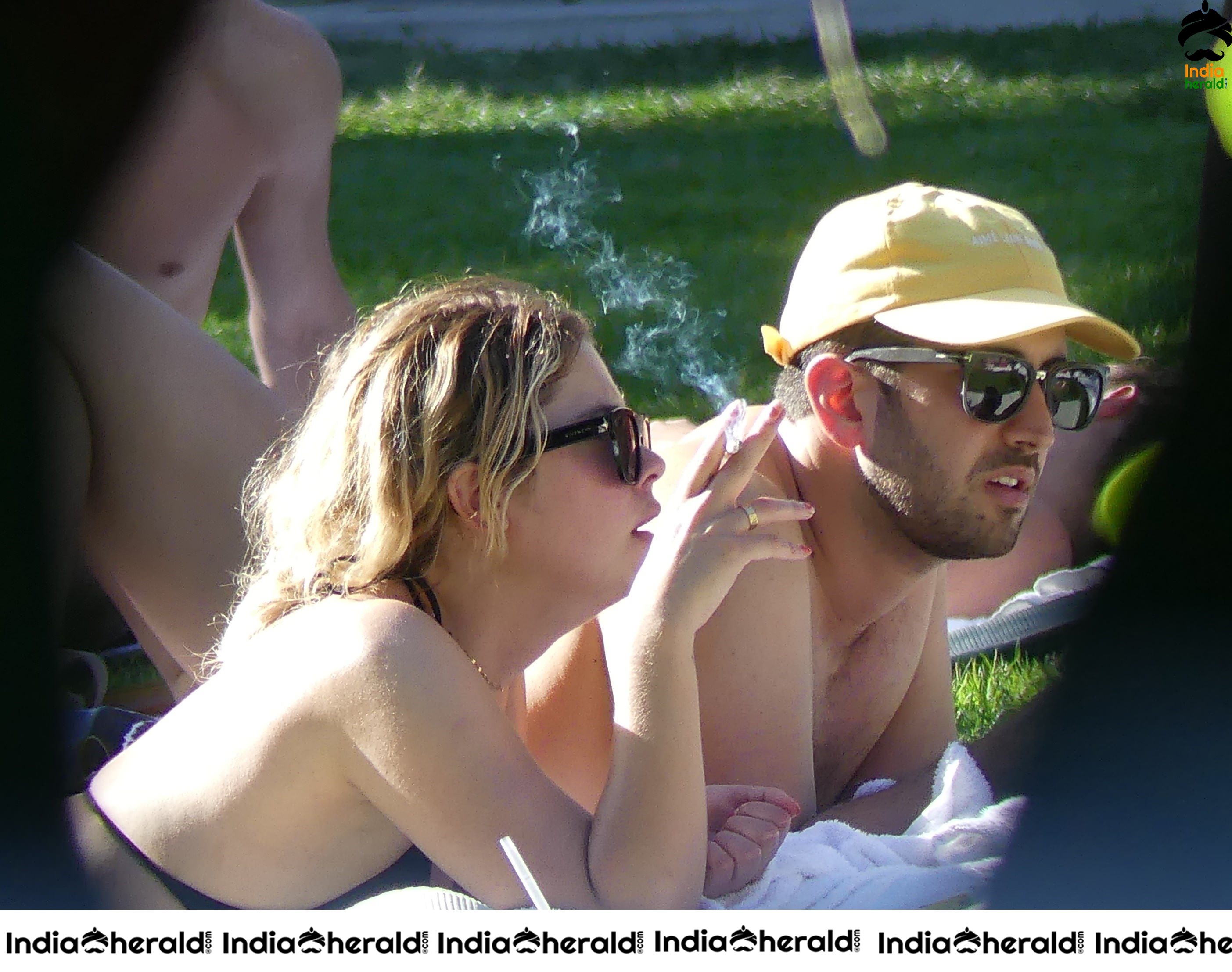 Ashley Benson Caught Smoking and Sunbathing in a Bikini in Miami Set 1