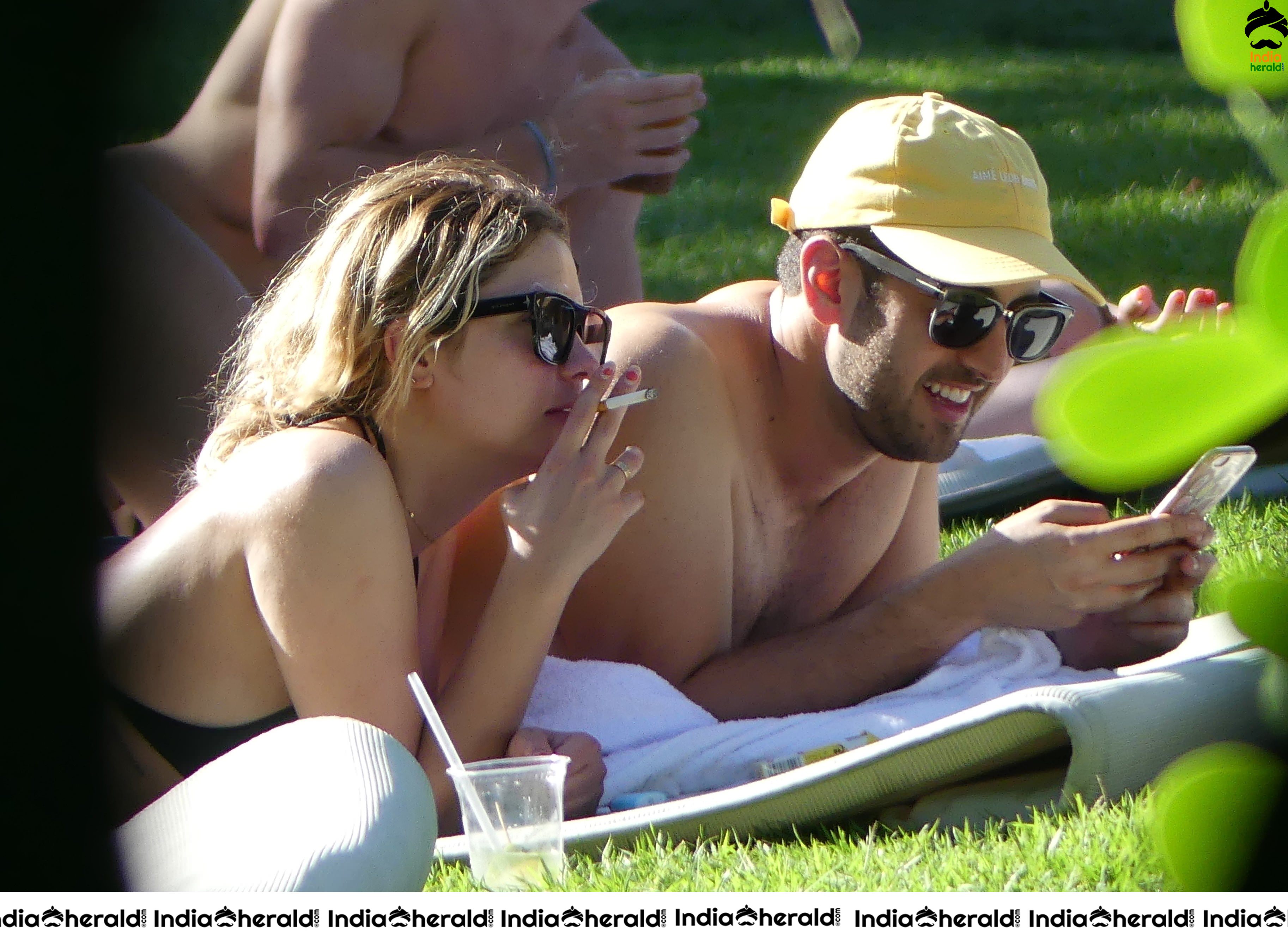 Ashley Benson Caught Smoking and Sunbathing in a Bikini in Miami Set 1