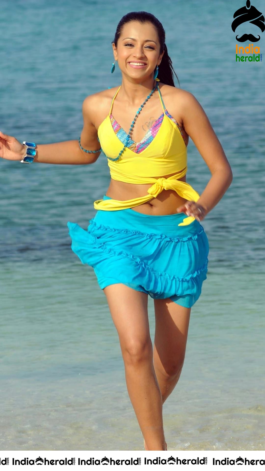 Beach Babe Trisha exposing her Thundering Thighs and Deep Navel Set 1