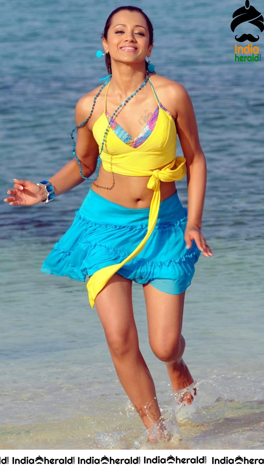 Beach Babe Trisha exposing her Thundering Thighs and Deep Navel Set 1