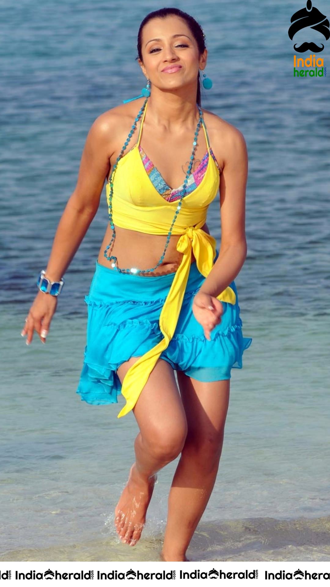 Beach Babe Trisha exposing her Thundering Thighs and Deep Navel Set 2