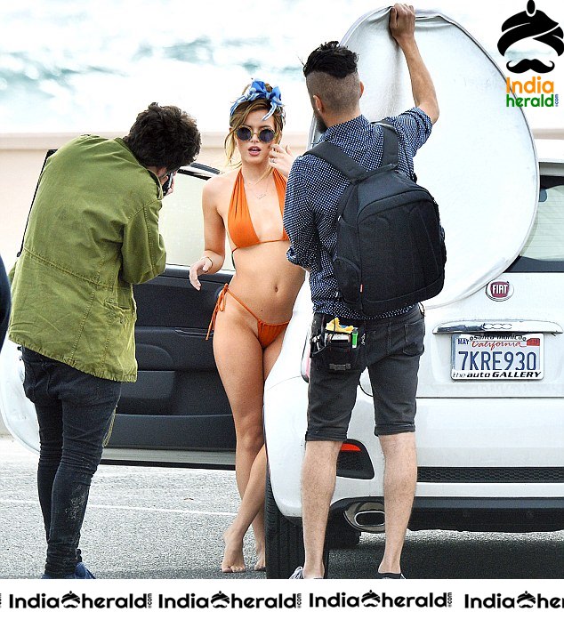 Bella Thorne at a Bikini Photoshoot in Zuma Beach