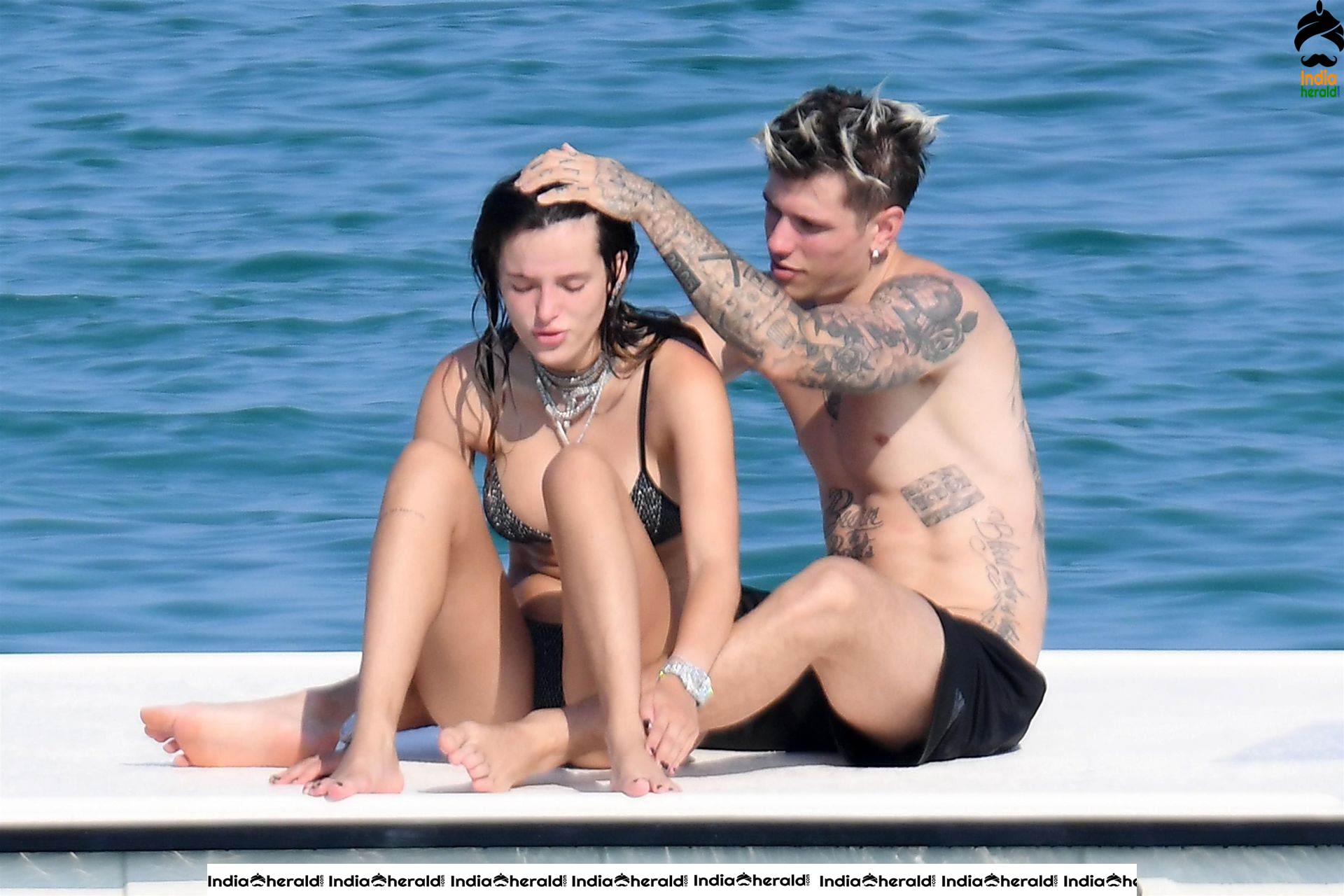 Bella Thorne in Black Lace Bikini Exposing and Enjoying with Boyfriend in Beach Set 1