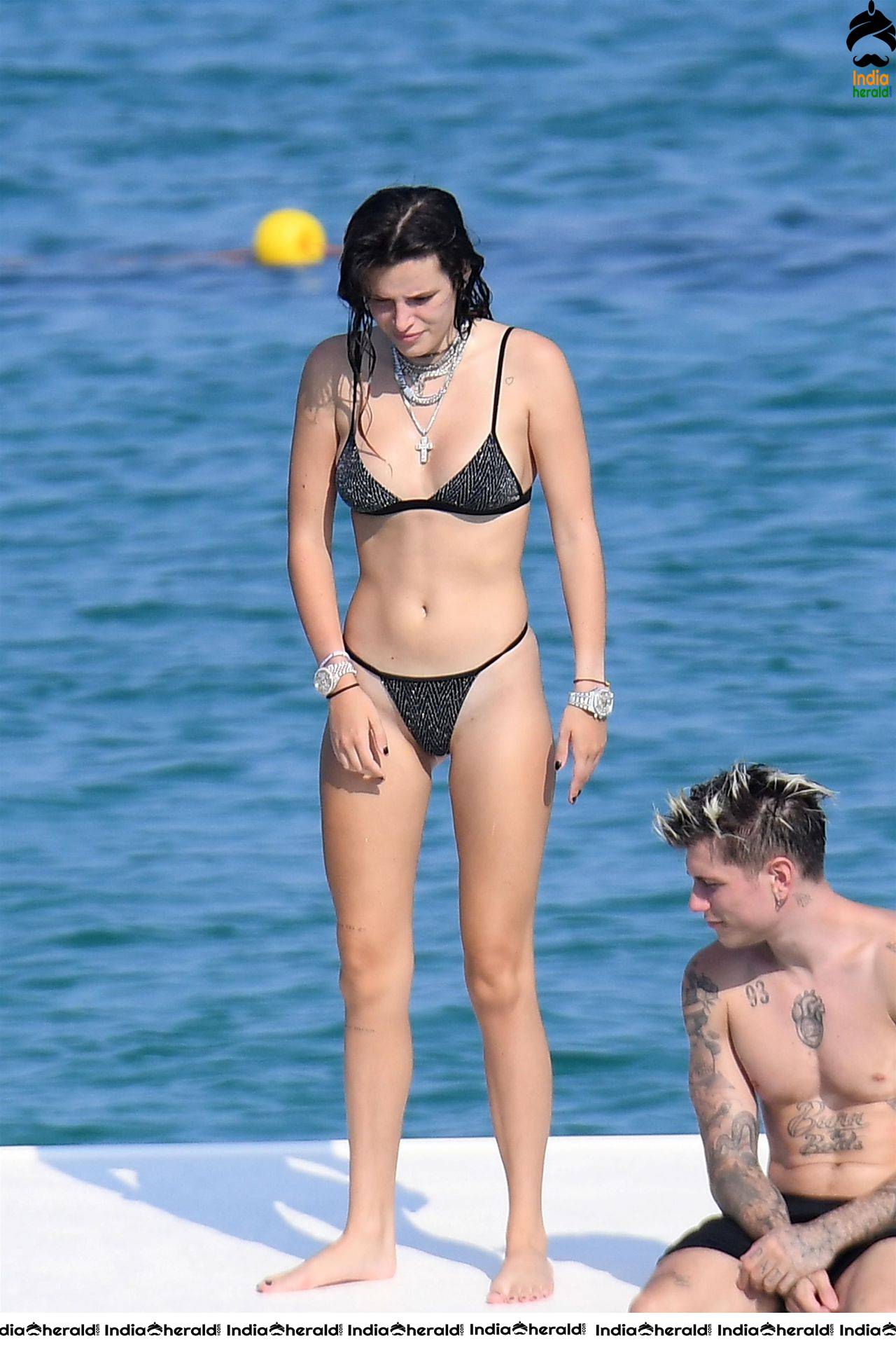 Bella Thorne in Black Lace Bikini Exposing and Enjoying with Boyfriend in Beach Set 1