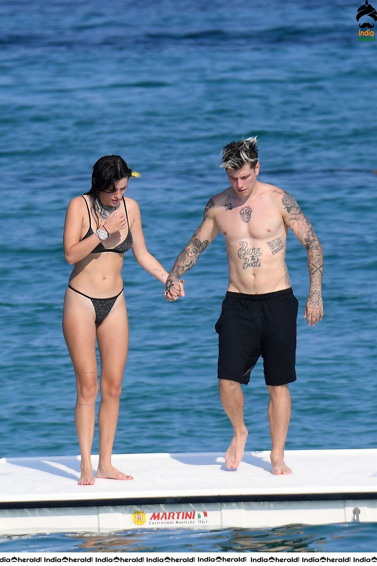 Bella Thorne in Black Lace Bikini Exposing and Enjoying with Boyfriend in Beach Set 1