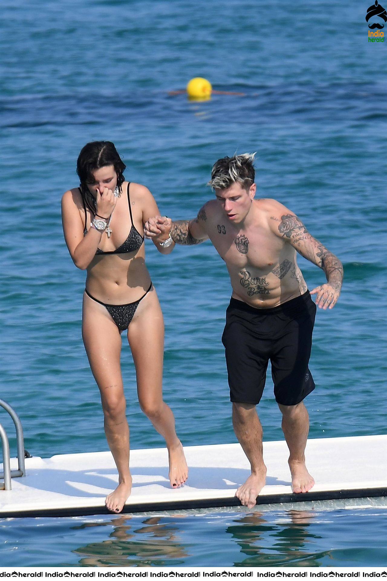 Bella Thorne in Black Lace Bikini Exposing and Enjoying with Boyfriend in Beach Set 2