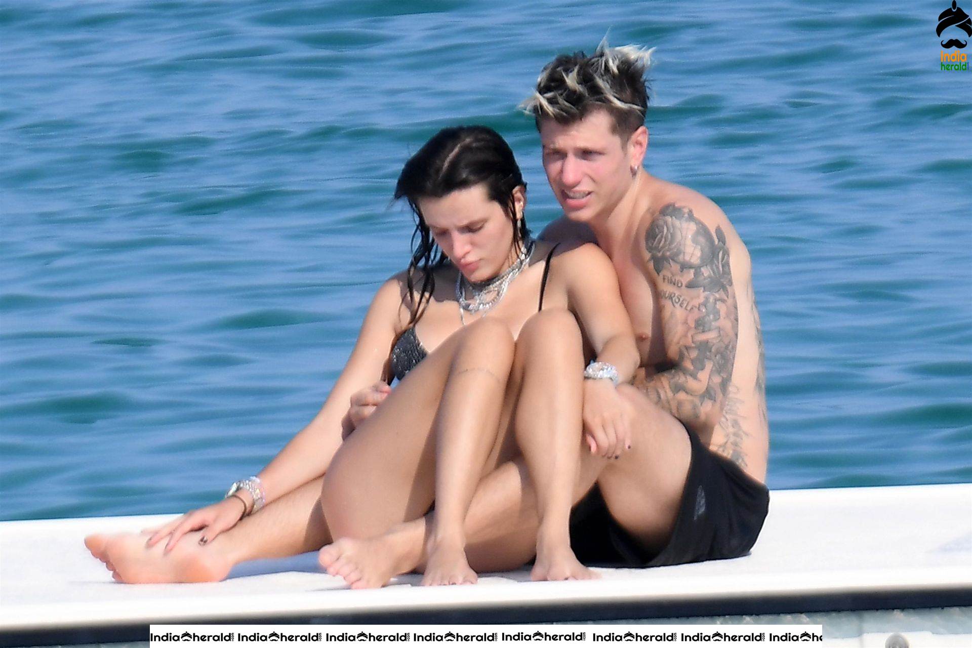 Bella Thorne in Black Lace Bikini Exposing and Enjoying with Boyfriend in Beach Set 2