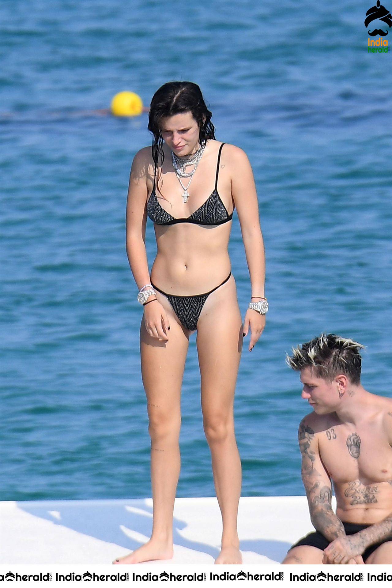 Bella Thorne in tiny Black Bikini and her Boyfriend smooches her in Public Set 1