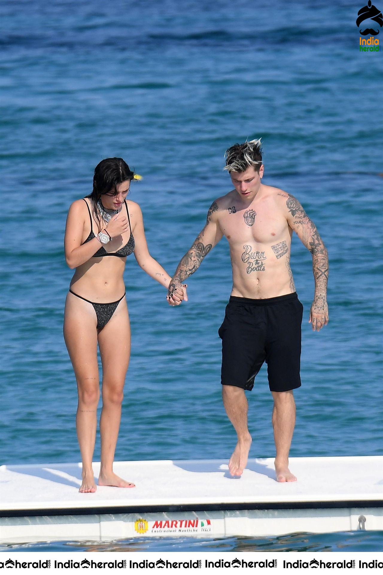 Bella Thorne in tiny Black Bikini and her Boyfriend smooches her in Public Set 1