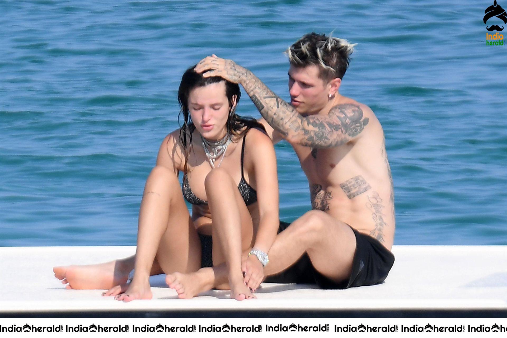 Bella Thorne in tiny Black Bikini and her Boyfriend smooches her in Public Set 2