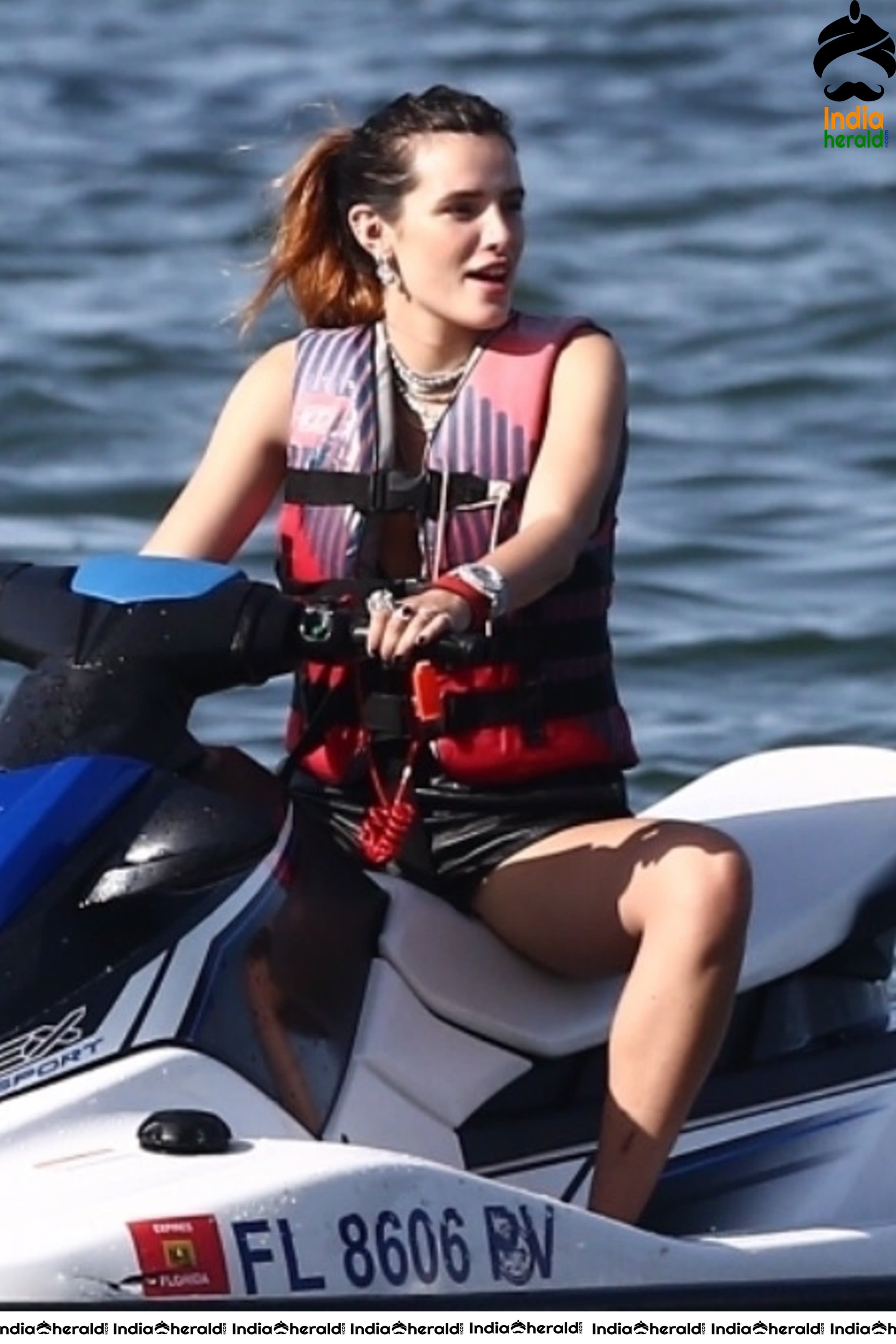 Bella Thorne too hot and tempting in Black Bikini while jet skiing in Miami Set 1