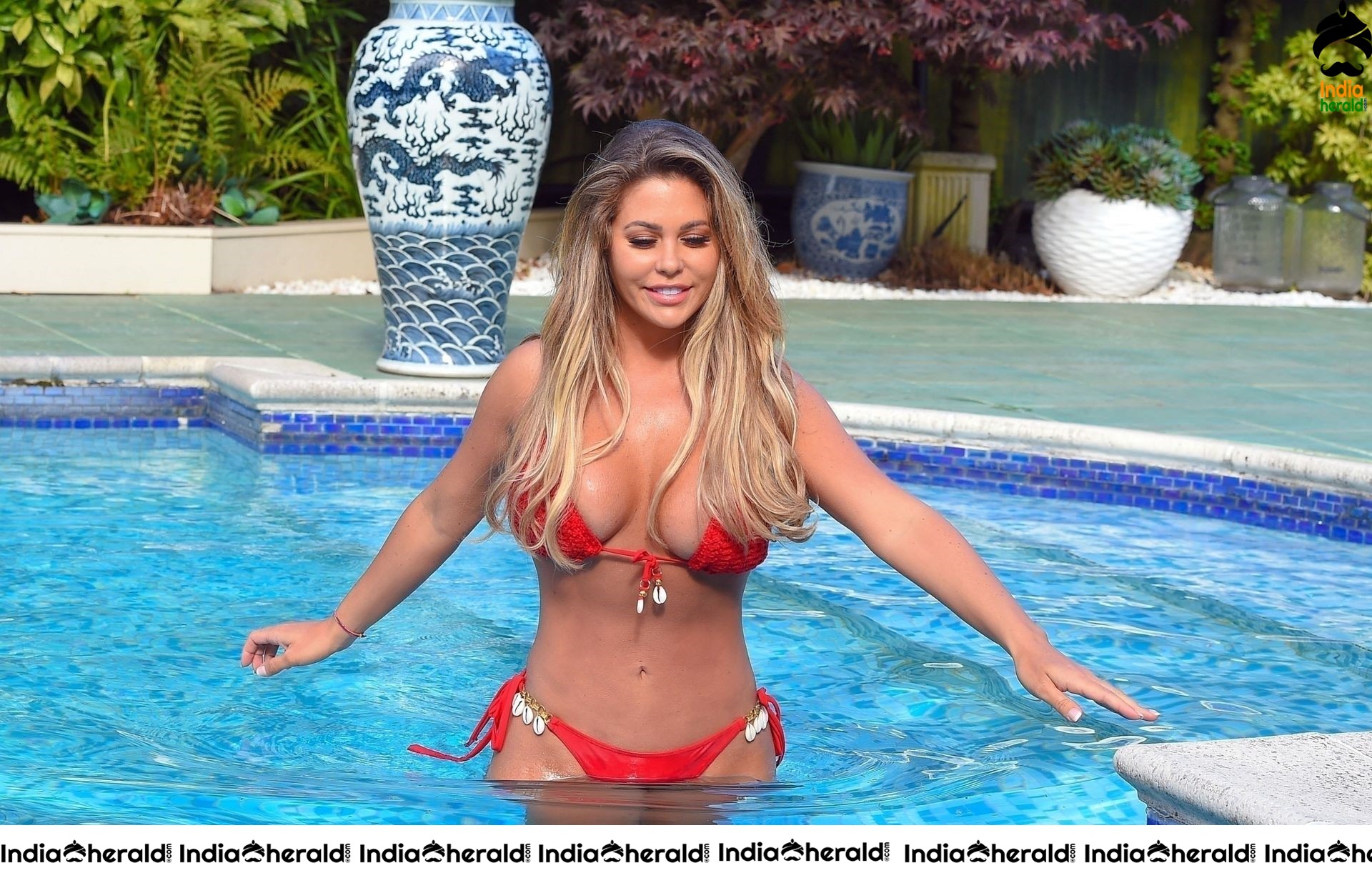 Bianca Gascoigne in Bright Red Bikini around the pool at her hotel in Greece