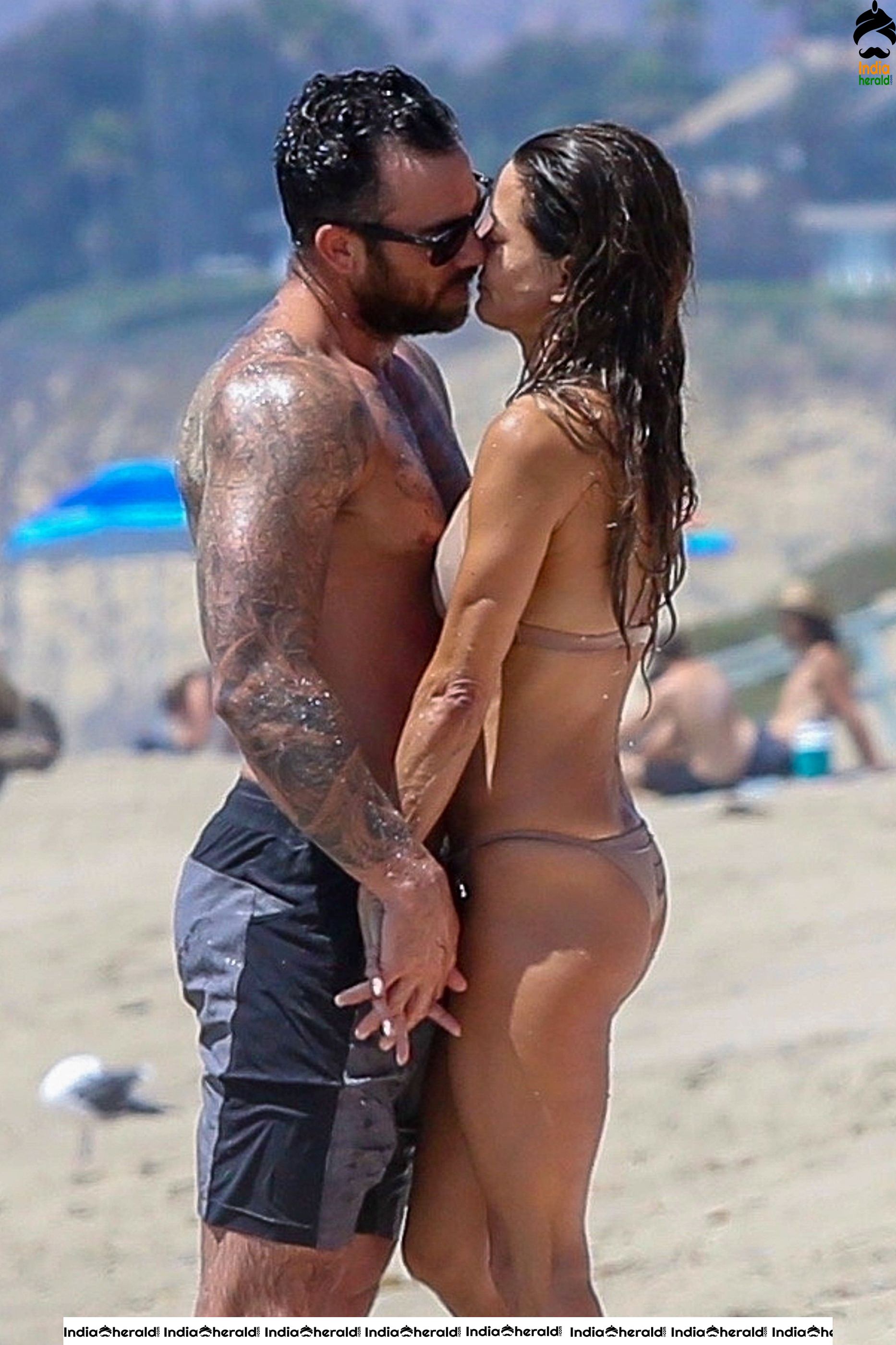 Brooke Burke in Bikini and Enjoying with Boyfriend by Getting Wet on Beach Set 1