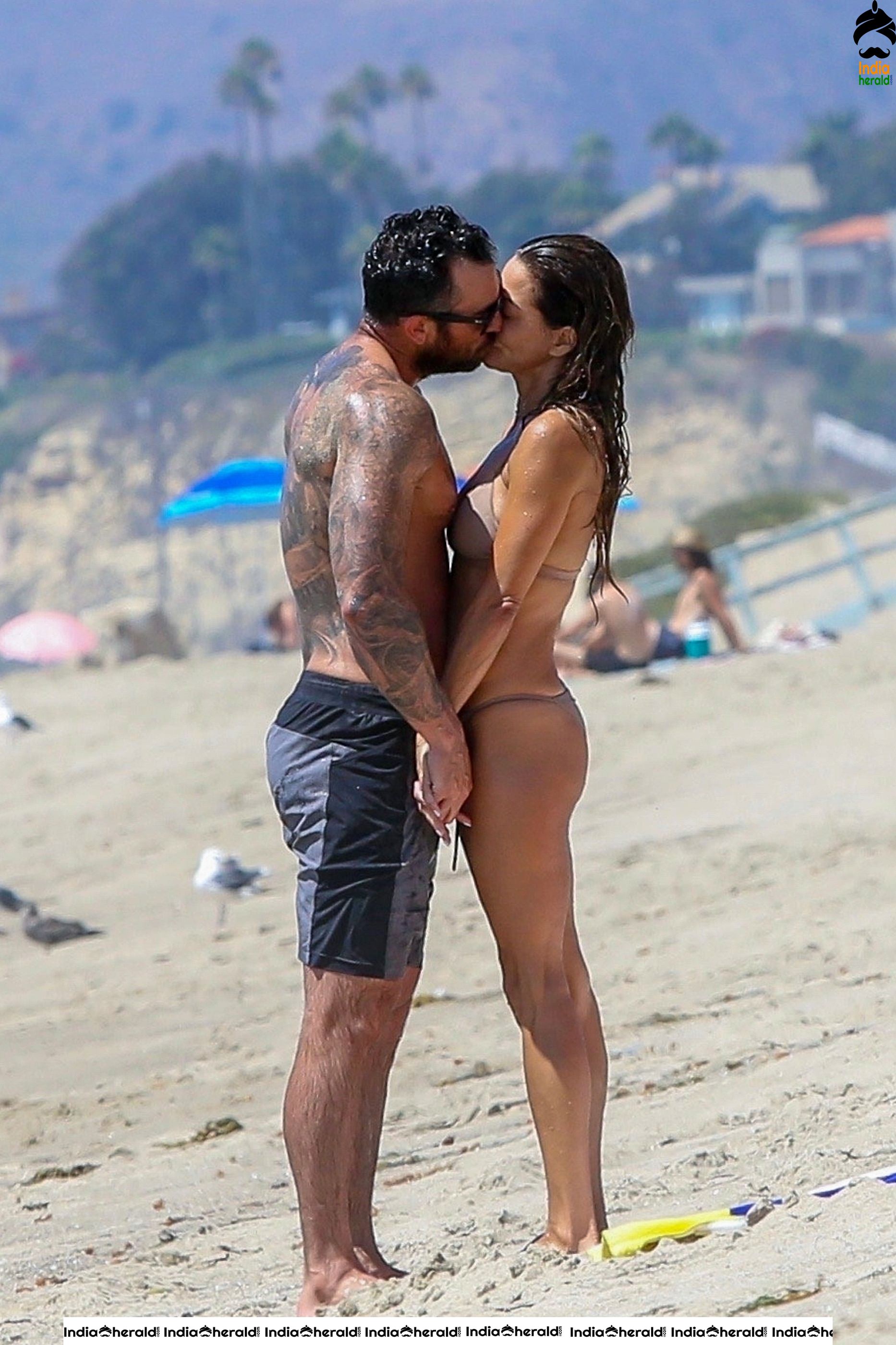 Brooke Burke in Bikini and Enjoying with Boyfriend by Getting Wet on Beach Set 1