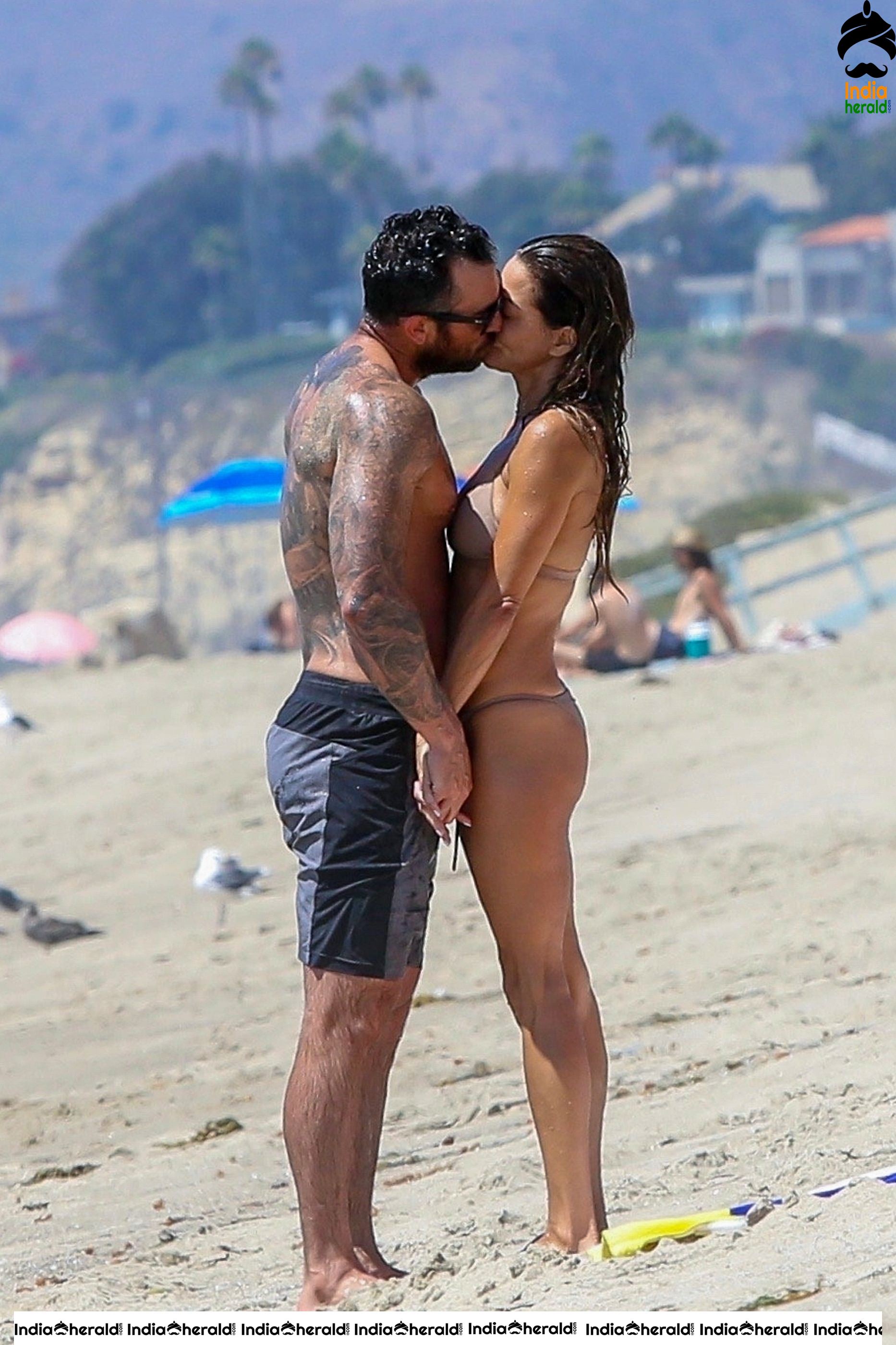 Brooke Burke in Bikini enjoying with Boyfriend on the beach in Malibu Set 1