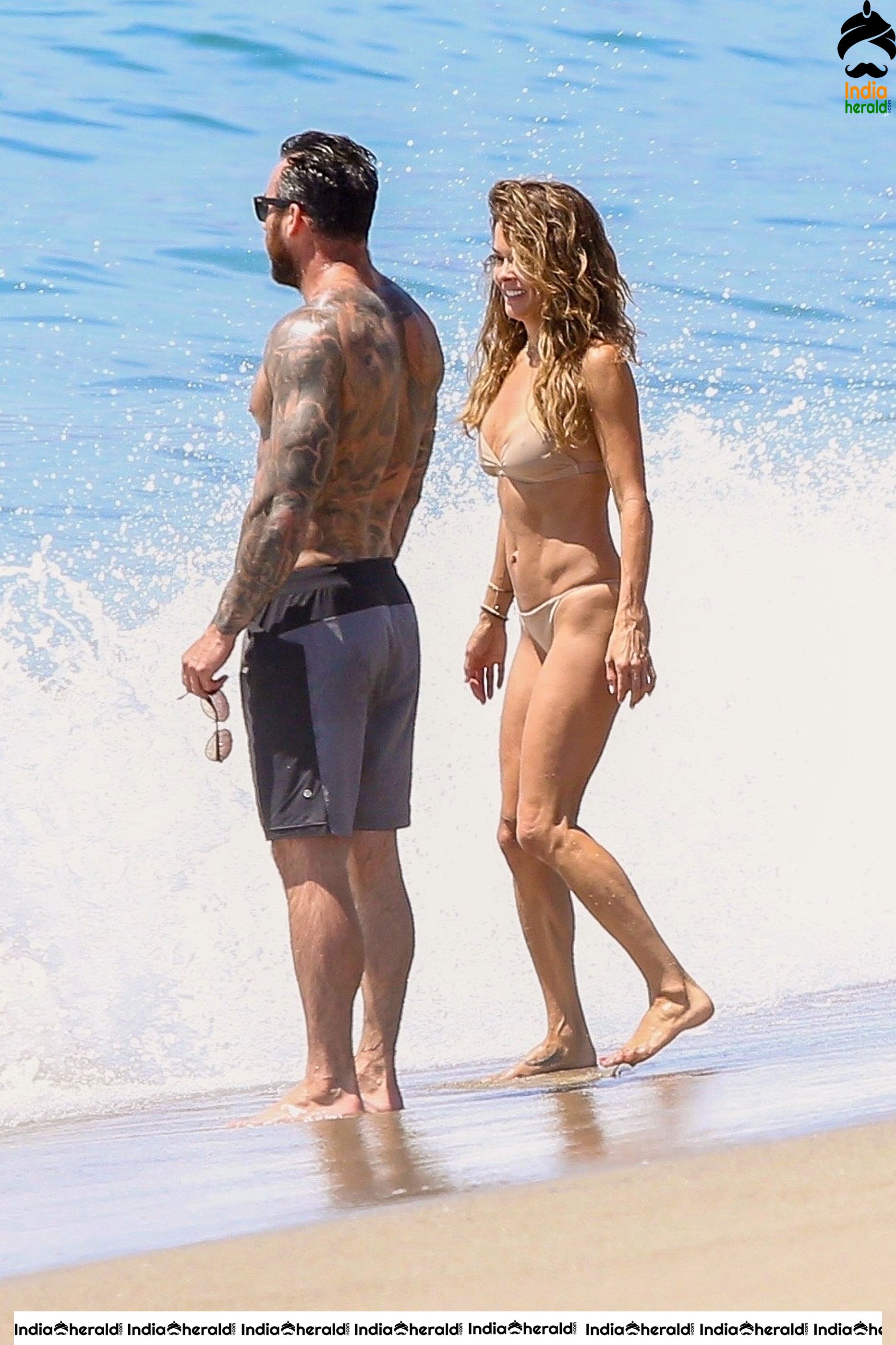 Brooke Burke in Bikini enjoying with Boyfriend on the beach in Malibu Set 2
