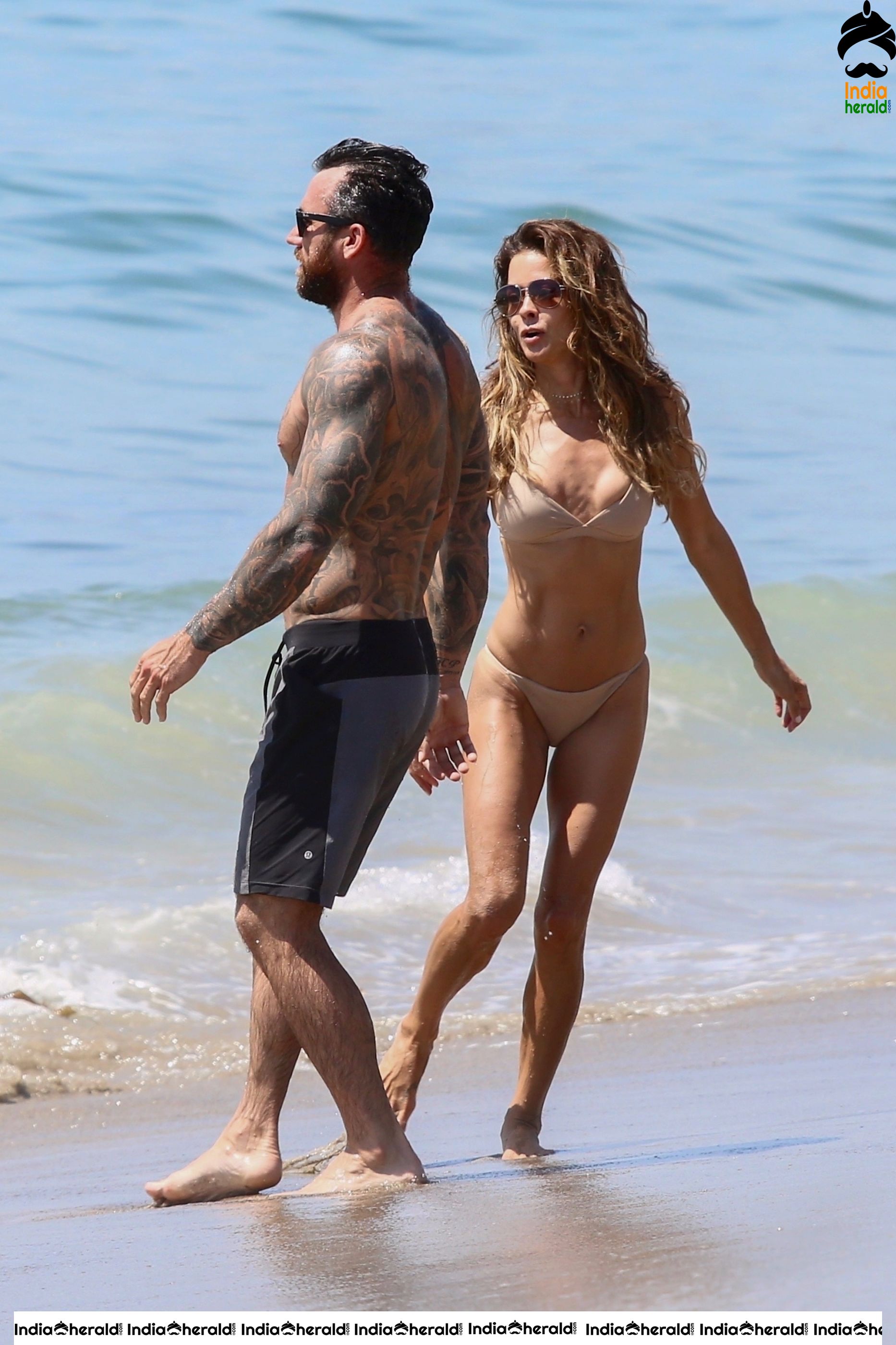 Brooke Burke in Bikini enjoying with Boyfriend on the beach in Malibu Set 2