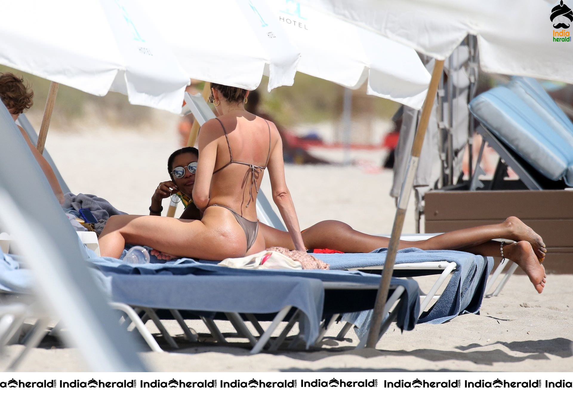 Candice Swanepoel in Bikini on the beach with her son in Miami Set 1
