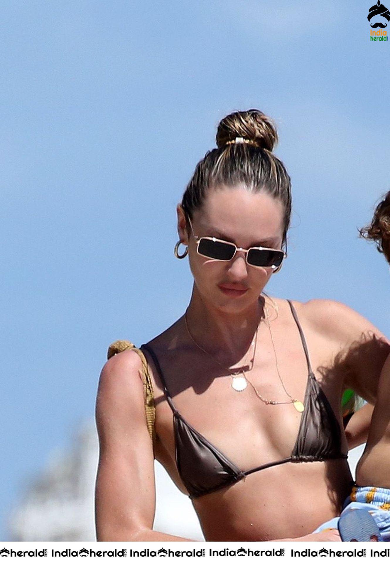 Candice Swanepoel in Bikini on the beach with her son in Miami Set 1