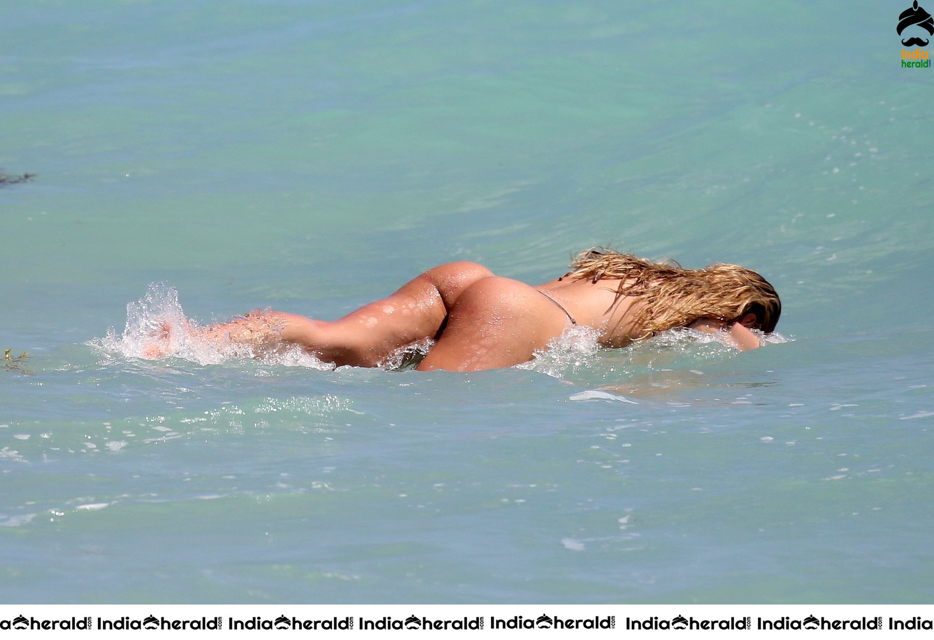 Candice Swanepoel in Bikini on the beach with her son in Miami Set 2