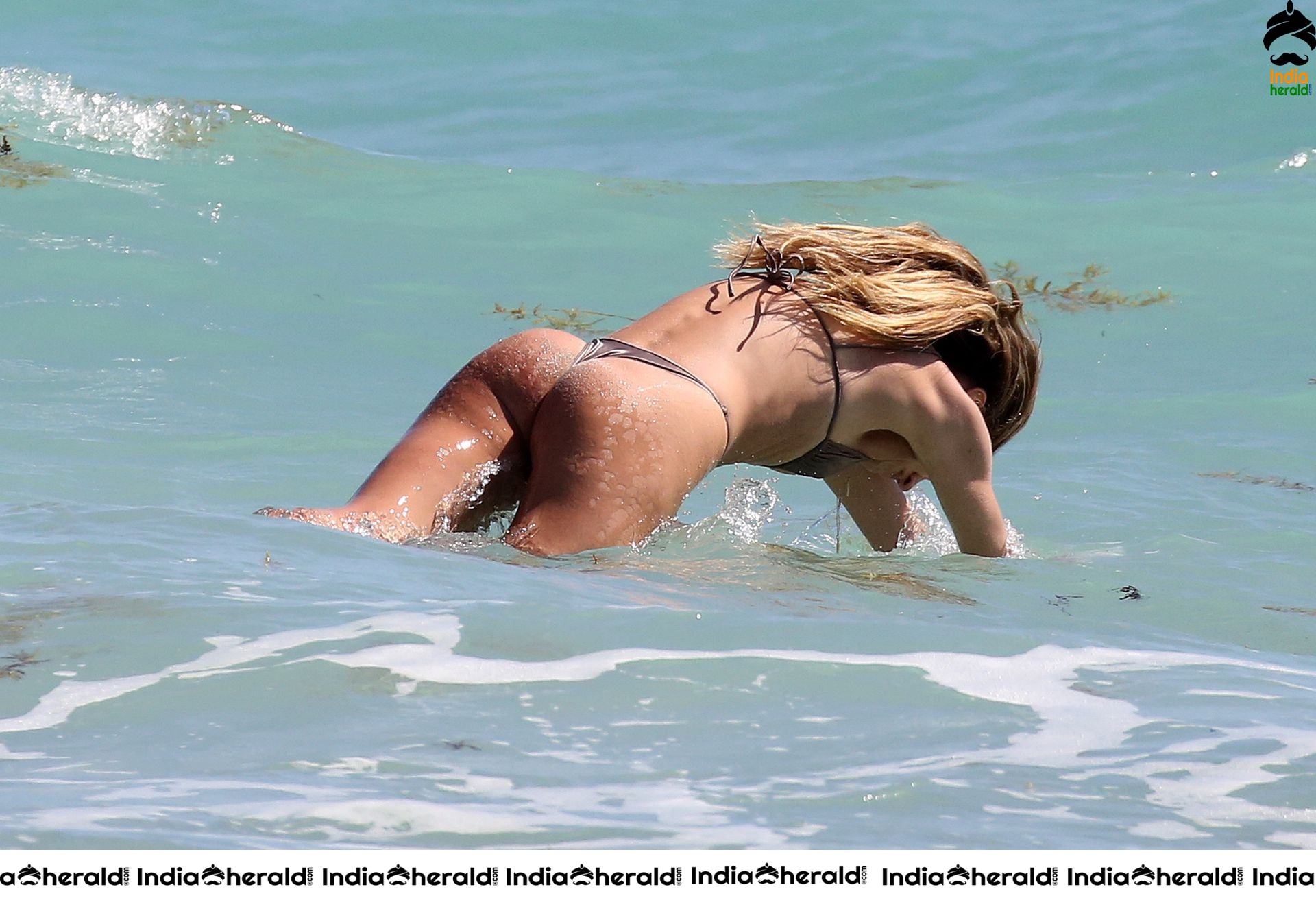 Candice Swanepoel in Bikini on the beach with her son in Miami Set 2