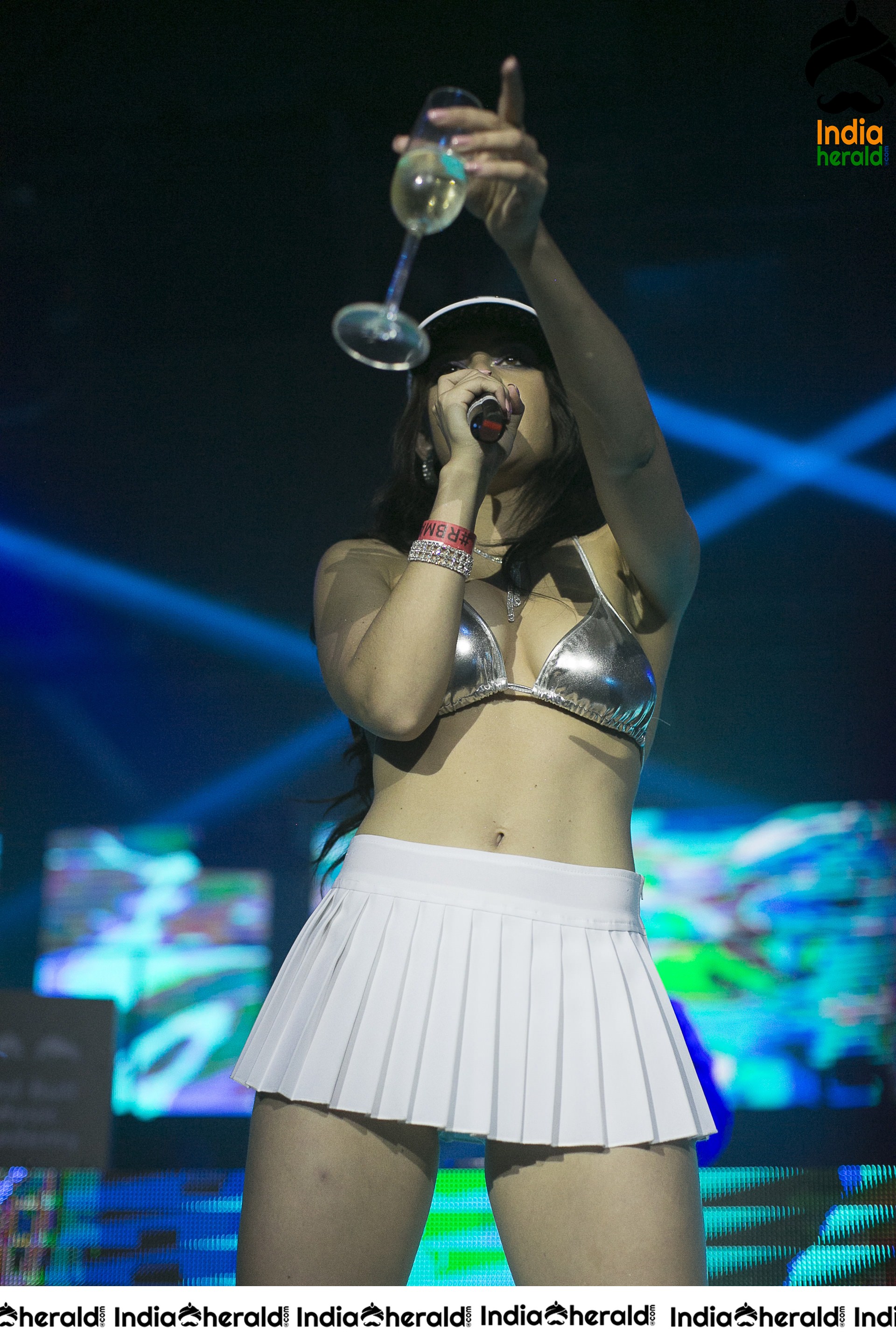 Charli XCX Wearing a mini skirt and Bikini top at Create Nightclub in LA Set 1