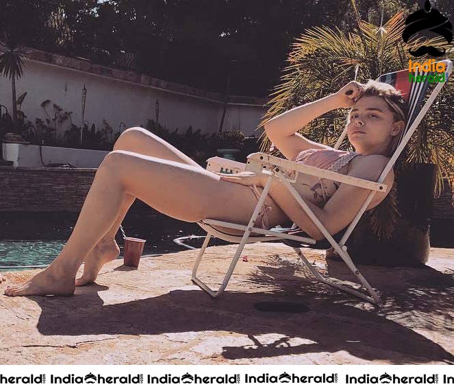 Chloe Moretz Wearing a Bikini at a Pool