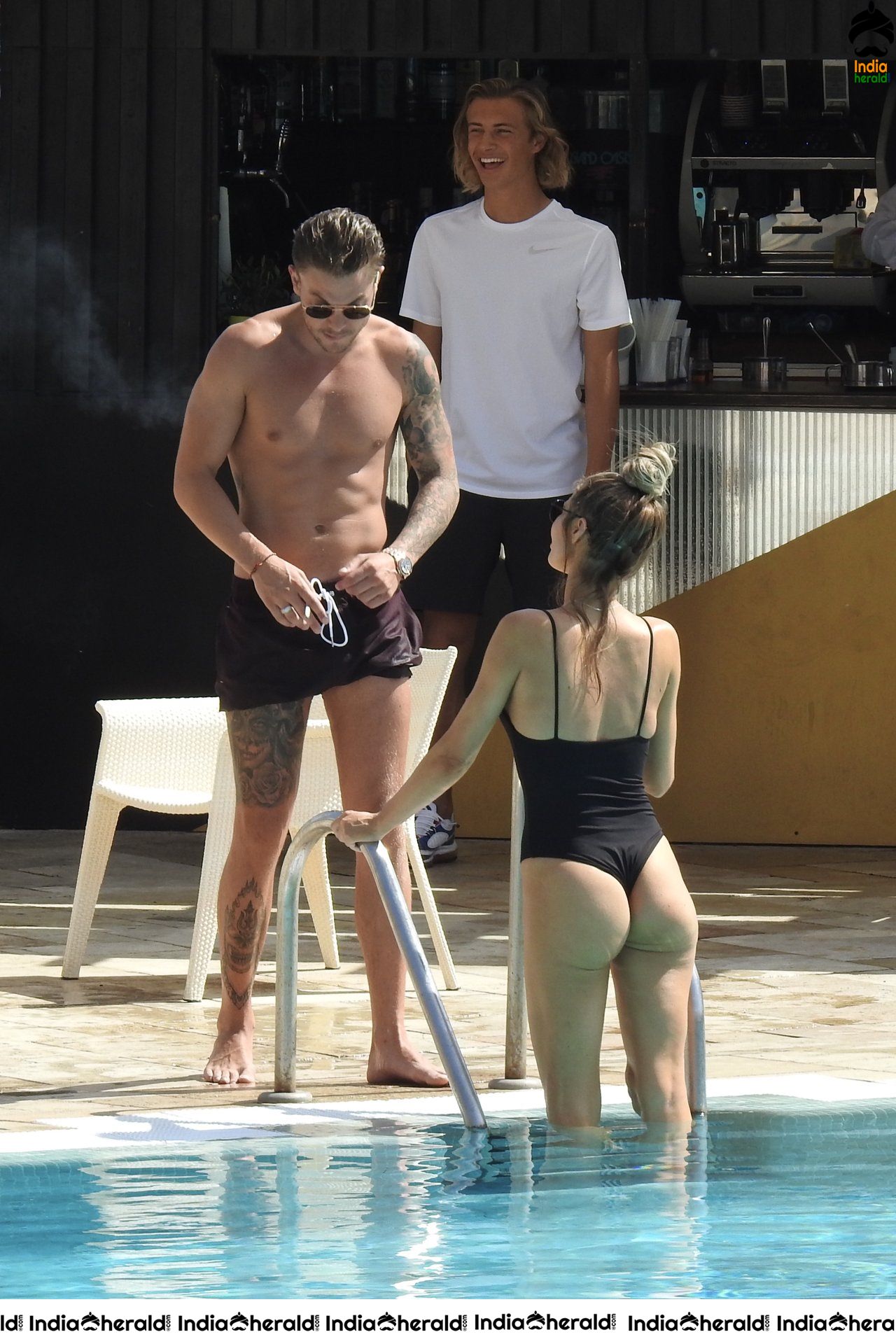 Chloe Sims in Bikini with her Boyfriend Sam Mucklow by the pool at a hotel in Marbella Set 1
