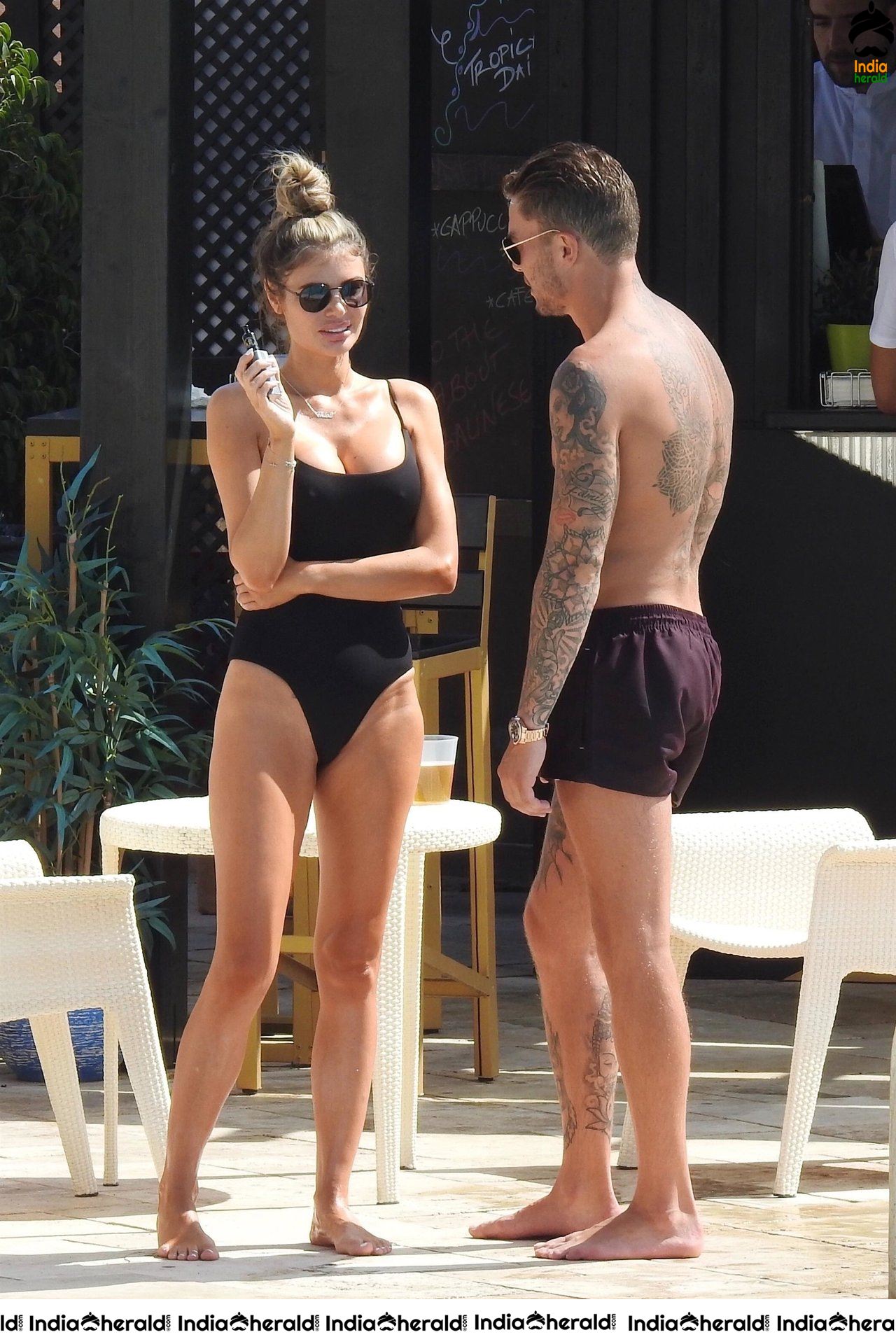 Chloe Sims in Bikini with her Boyfriend Sam Mucklow by the pool at a hotel in Marbella Set 1