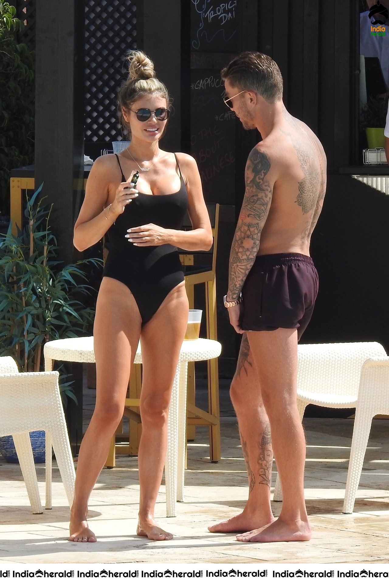 Chloe Sims in Bikini with her Boyfriend Sam Mucklow by the pool at a hotel in Marbella Set 1