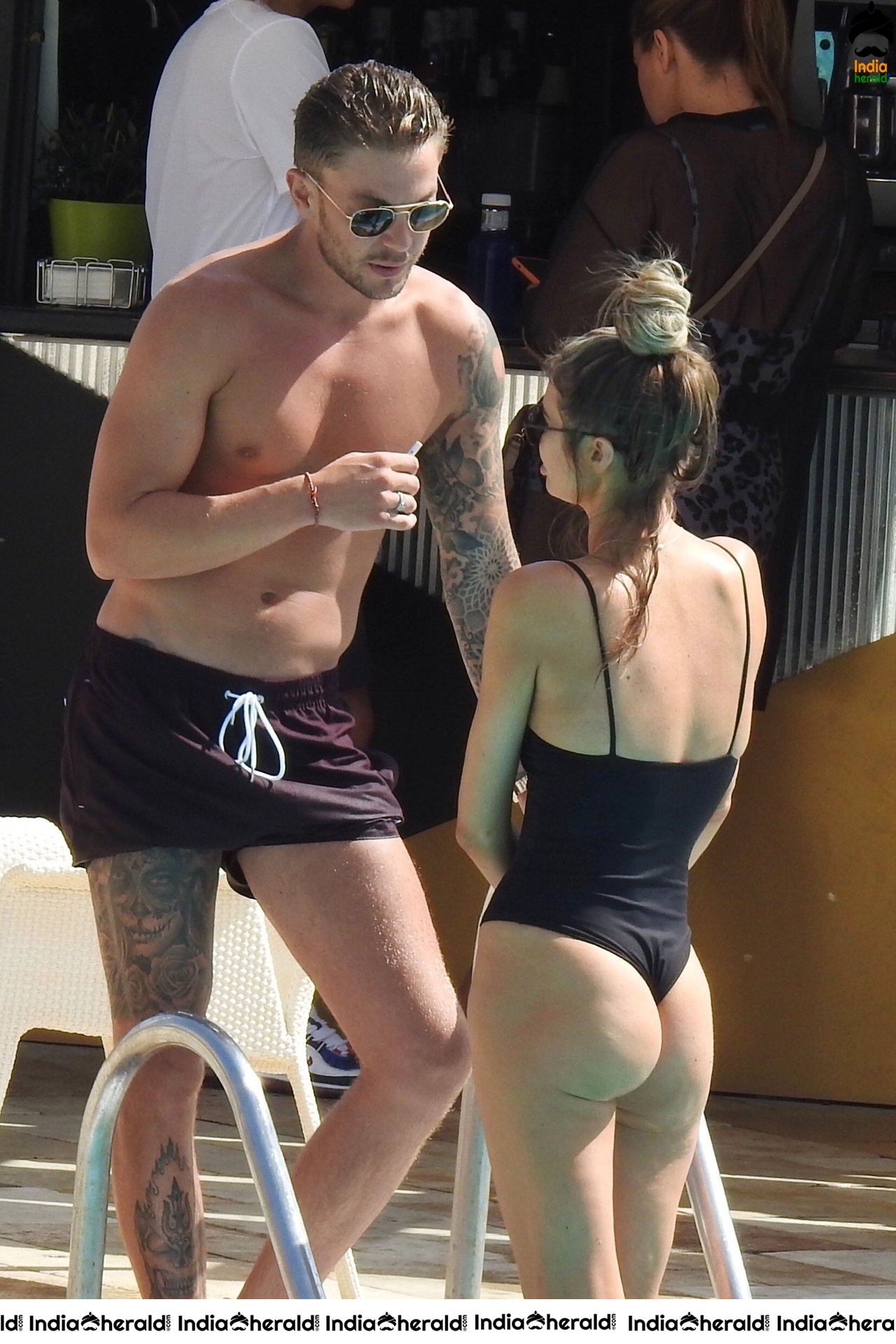 Chloe Sims in Bikini with her Boyfriend Sam Mucklow by the pool at a hotel in Marbella Set 2