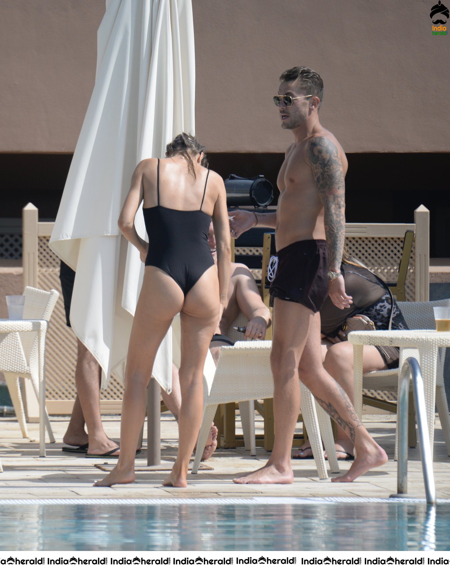 Chloe Sims in Bikini with her Boyfriend Sam Mucklow by the pool at a hotel in Marbella Set 2