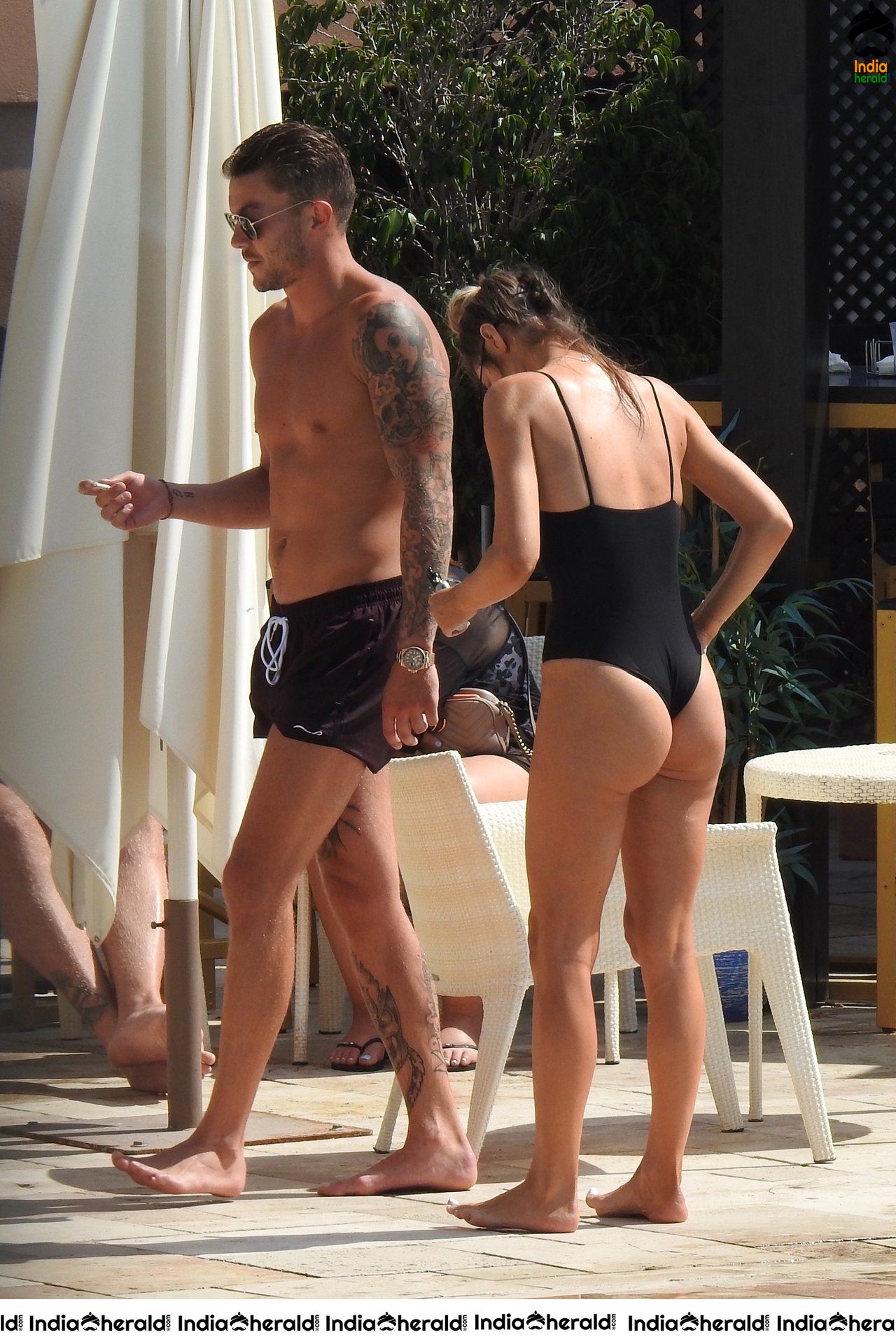 Chloe Sims in Bikini with her Boyfriend Sam Mucklow by the pool at a hotel in Marbella Set 2