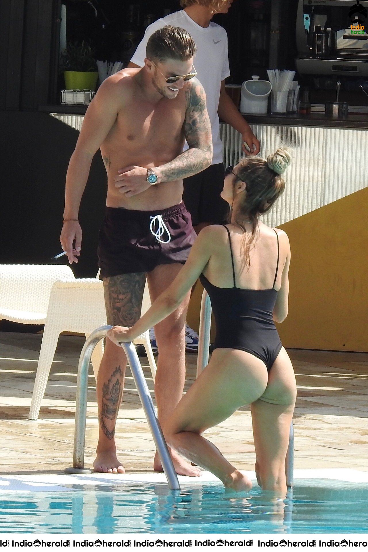 Chloe Sims in Bikini with her Boyfriend Sam Mucklow by the pool at a hotel in Marbella Set 2