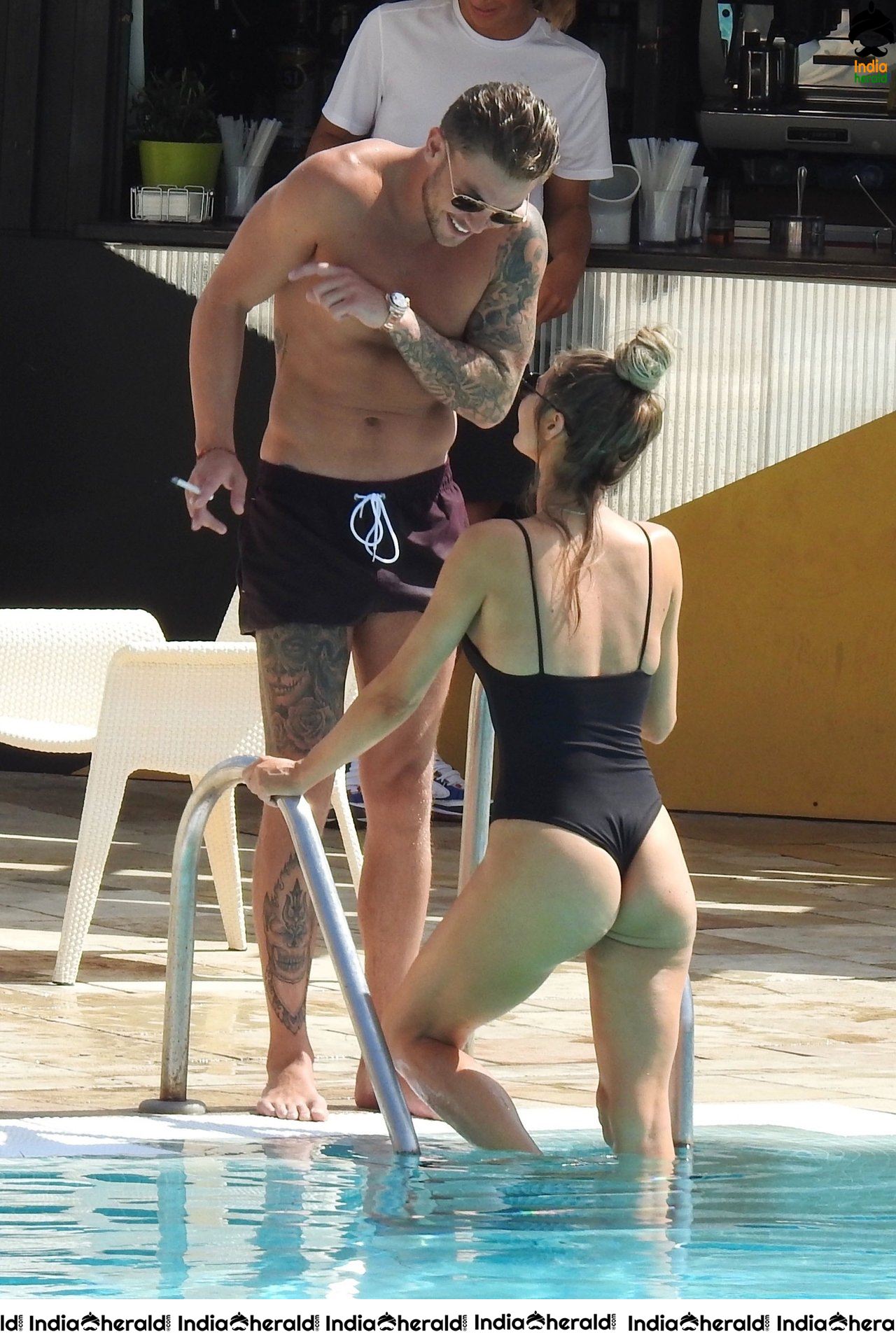 Chloe Sims in Bikini with her Boyfriend Sam Mucklow by the pool at a hotel in Marbella Set 2