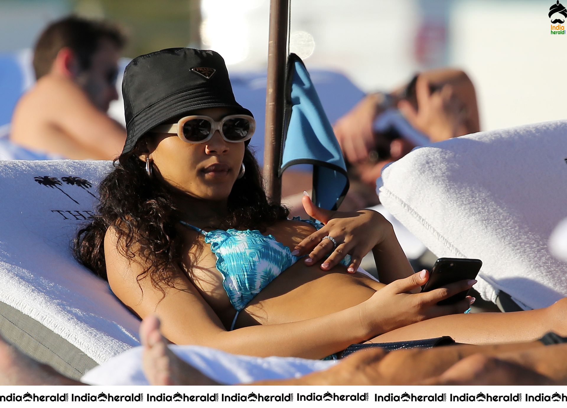 Danielle Herrington wears a blue string bikini at the Beach in Miami