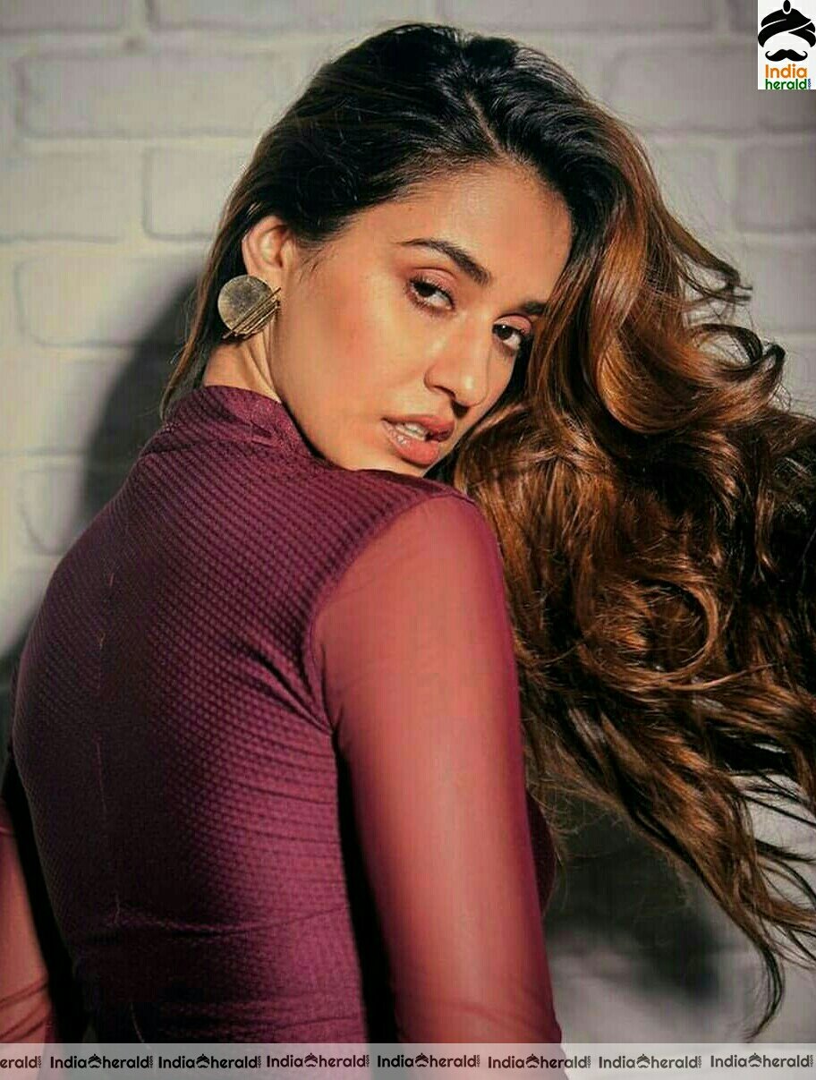 Disha Patani Hot Sizzling Show In Maroon Tight Short Dress Stills