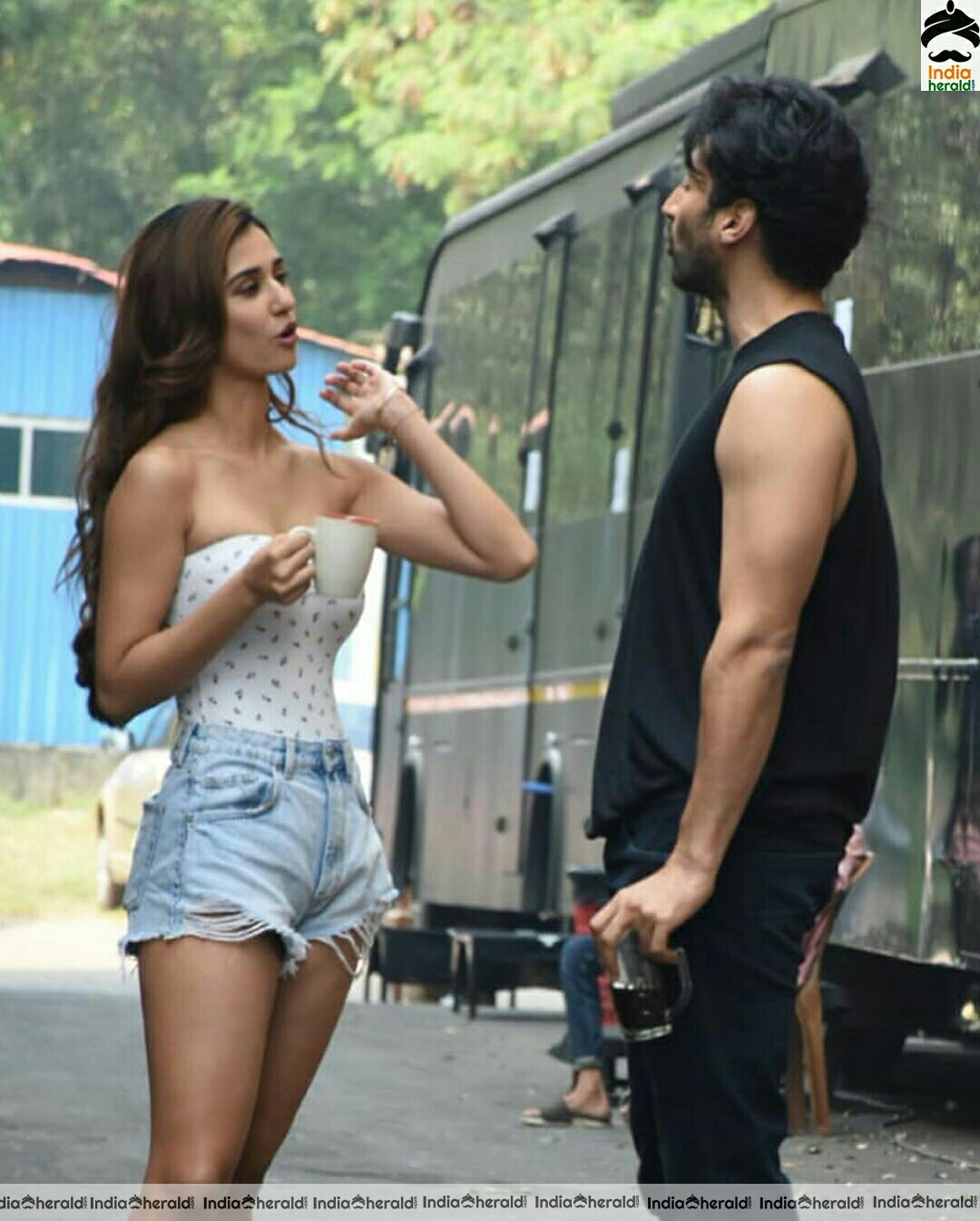 Disha Patani showing cleavage in Tube top and thighs in sexy shorts