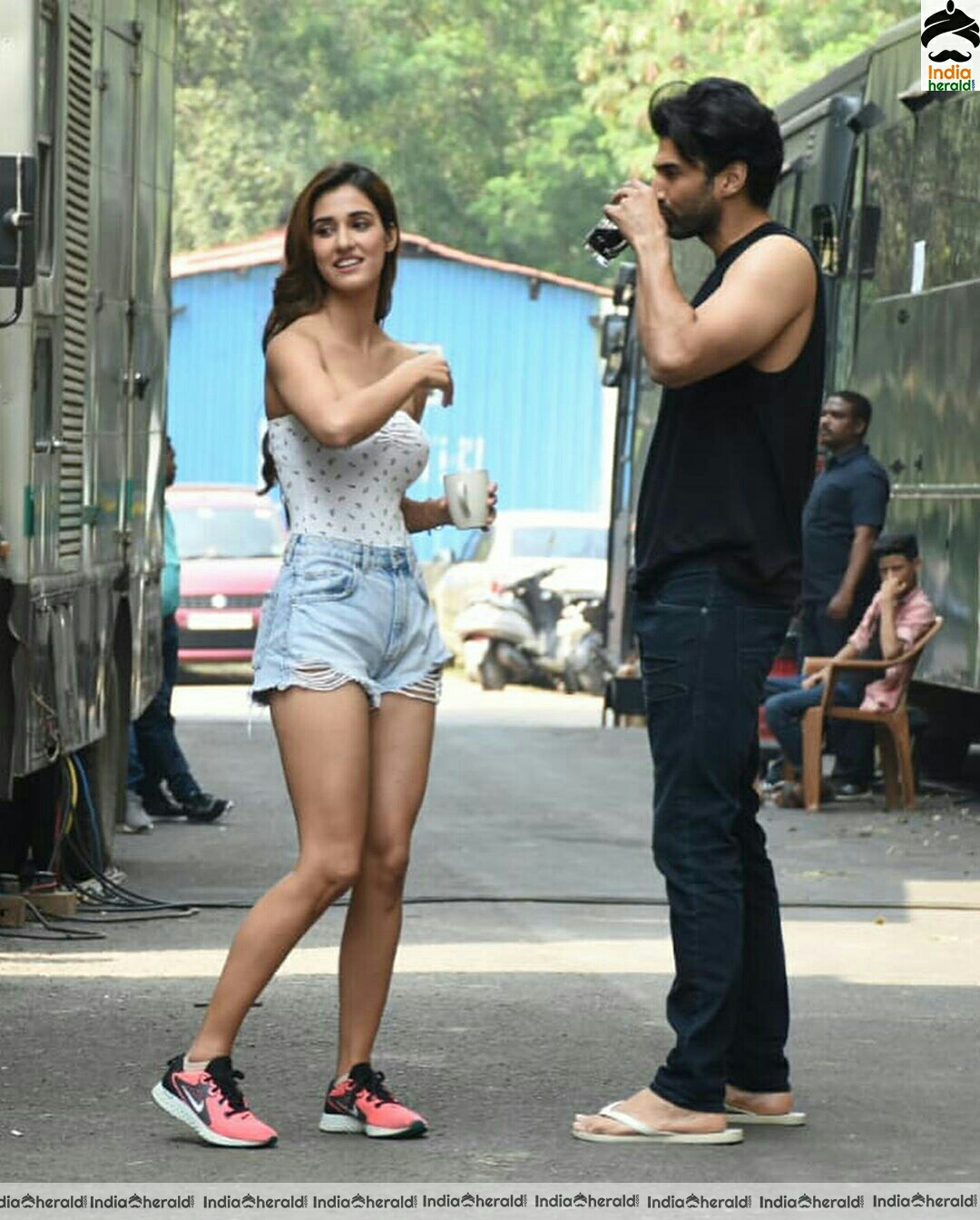 Disha Patani showing cleavage in Tube top and thighs in sexy shorts